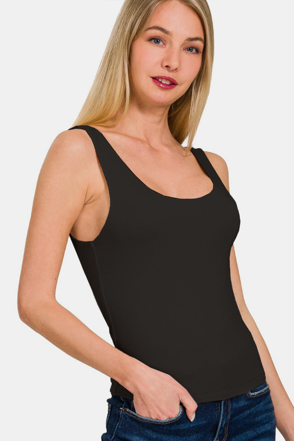 Classic dual layer round neck tank top from Trendsi, shown in a natural pose, highlighting the layered fabric and round neckline.