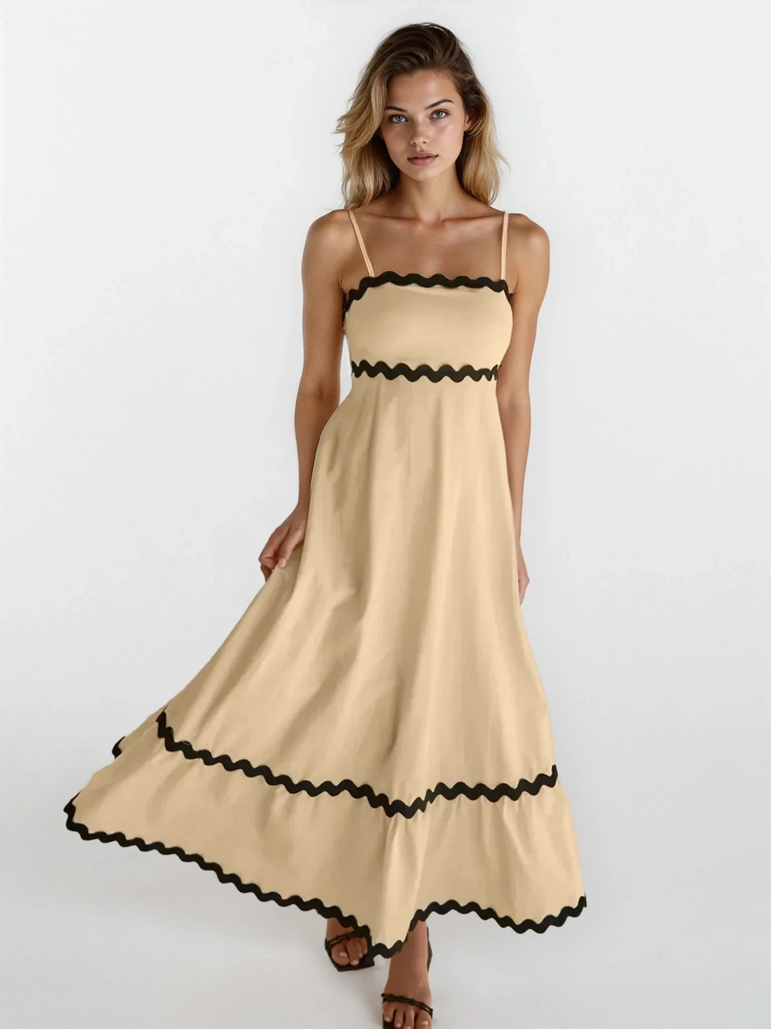 Light blue Tidal spaghetti strap maxi dress by Trendsi, flowing fabric, and fitted bodice shown on a model.