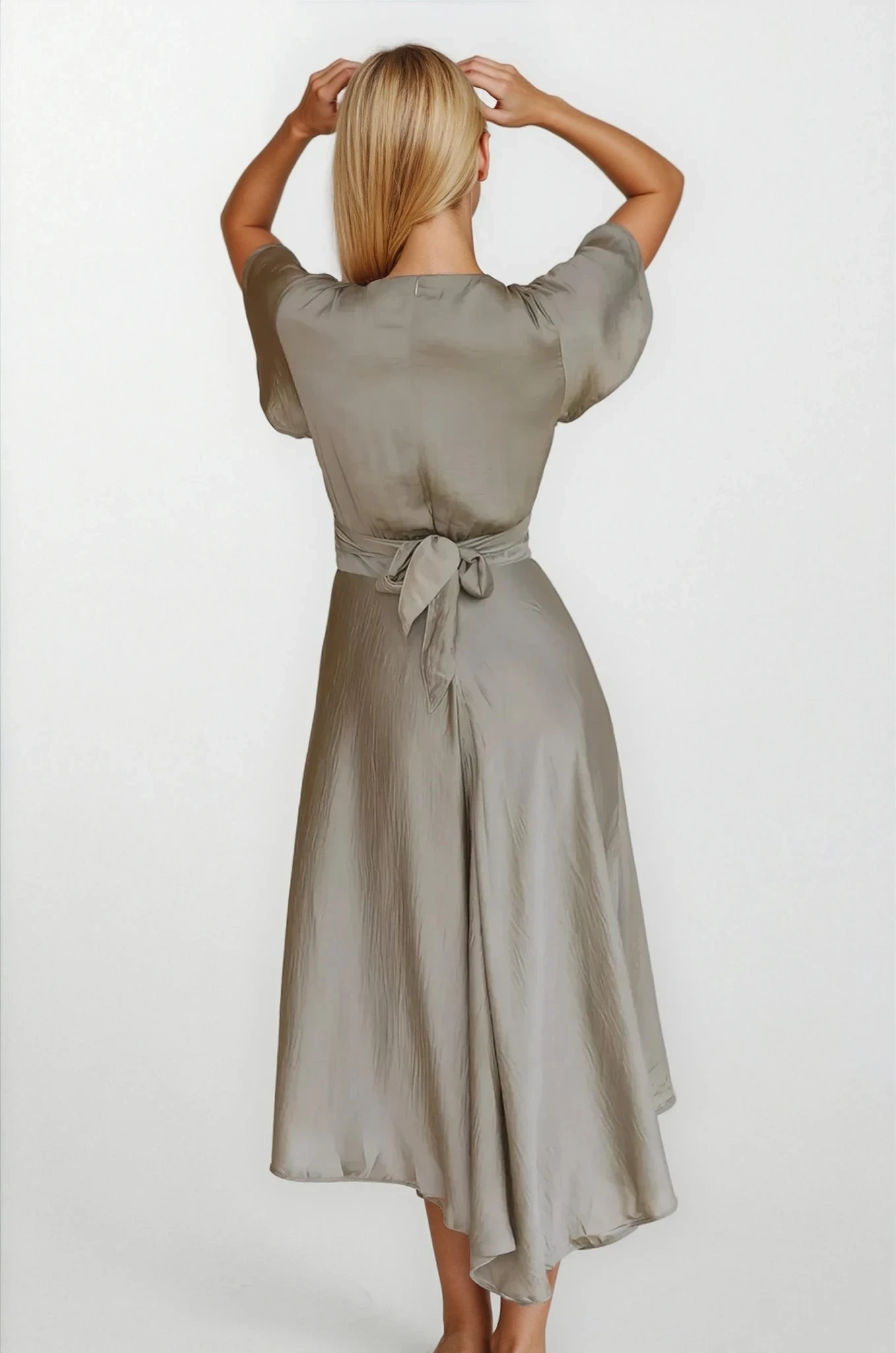 Light blue Evolve V-Neck High-Low Flutter Sleeve Dress by Trendsi, featuring a flowy silhouette and elegant flutter sleeves.