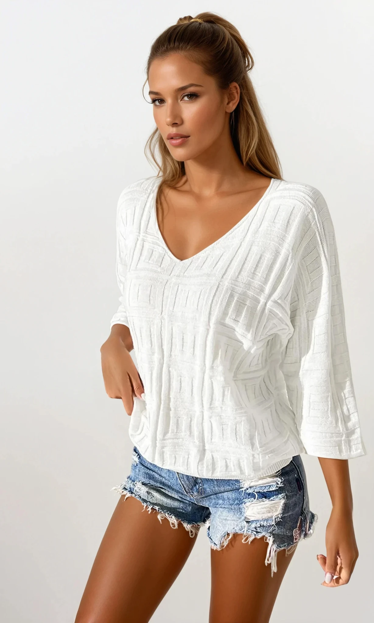 Maze V-neck three-quarter sleeve knit top by Trendsi, light-colored fabric, stylish and comfortable clothing for casual wear.