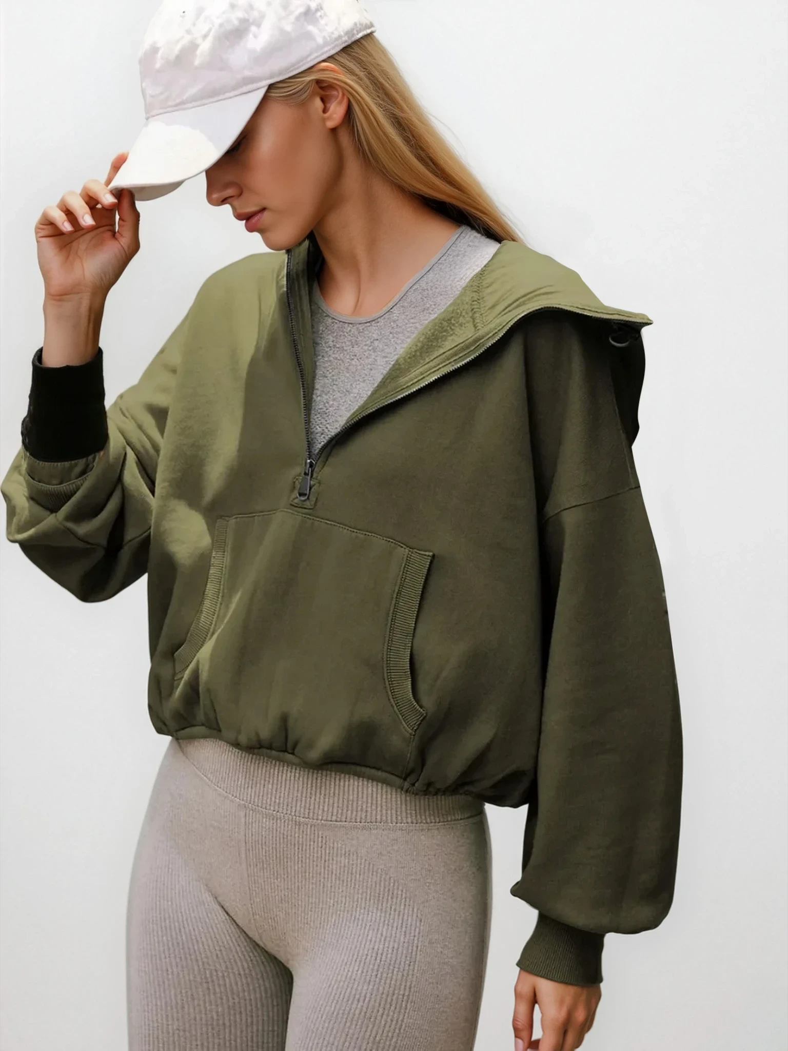 Light gray Pure Form half zip dropped shoulder hoodie by Trendsi, featuring a relaxed fit and casual style.