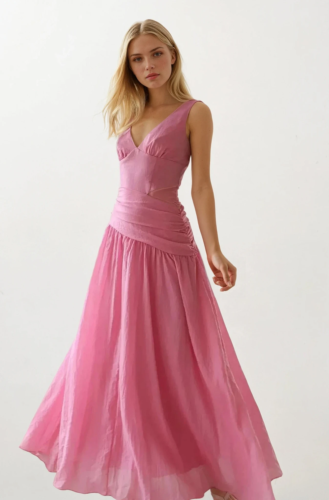 Slipstream cutout V-neck sleeveless maxi dress from Trendsi, featuring a stylish design with a flowing silhouette and cutout details.