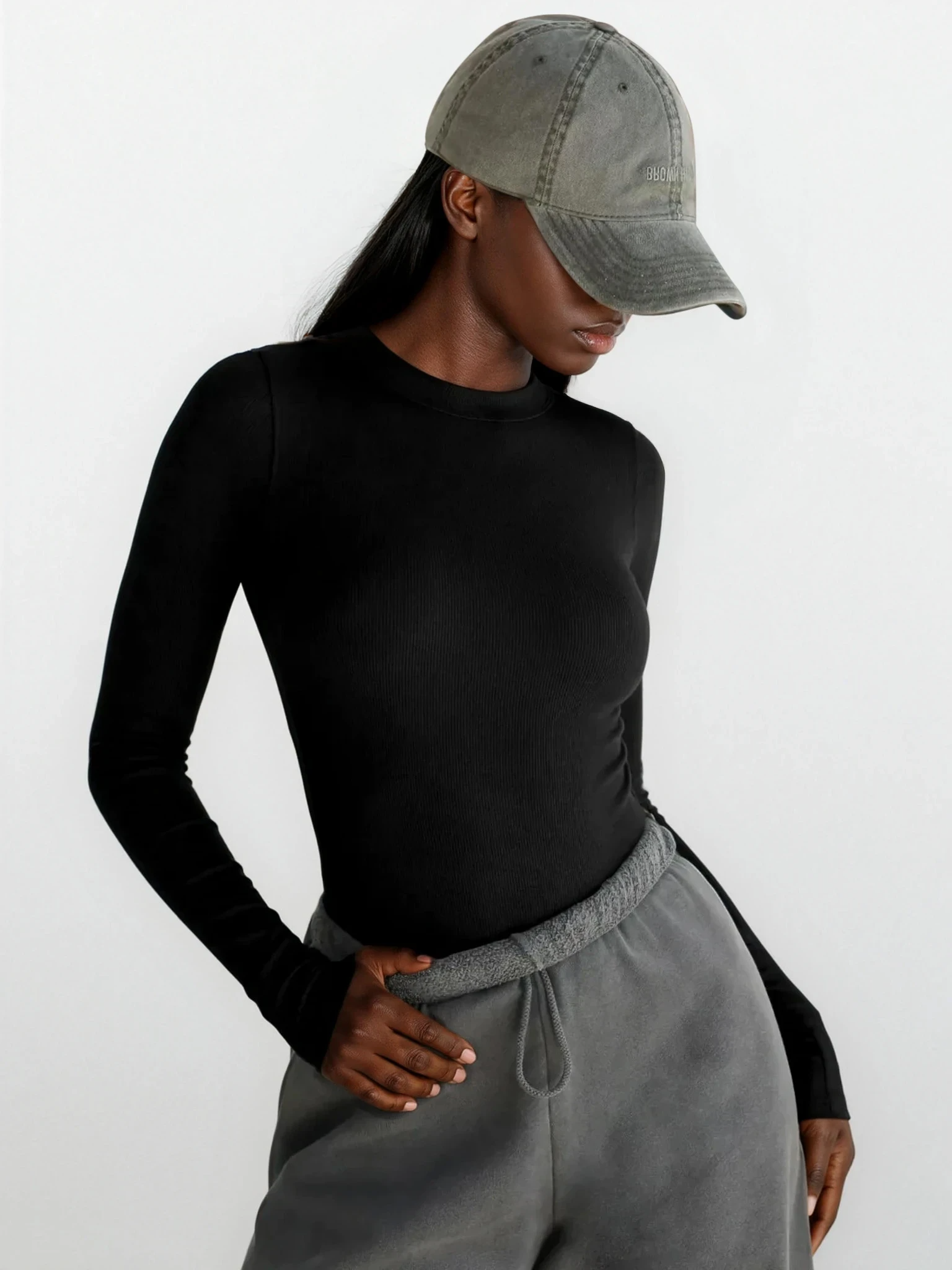 Light gray round neck long sleeve T-shirt by Trendsi, casual clothing with a comfortable fit and classic design.