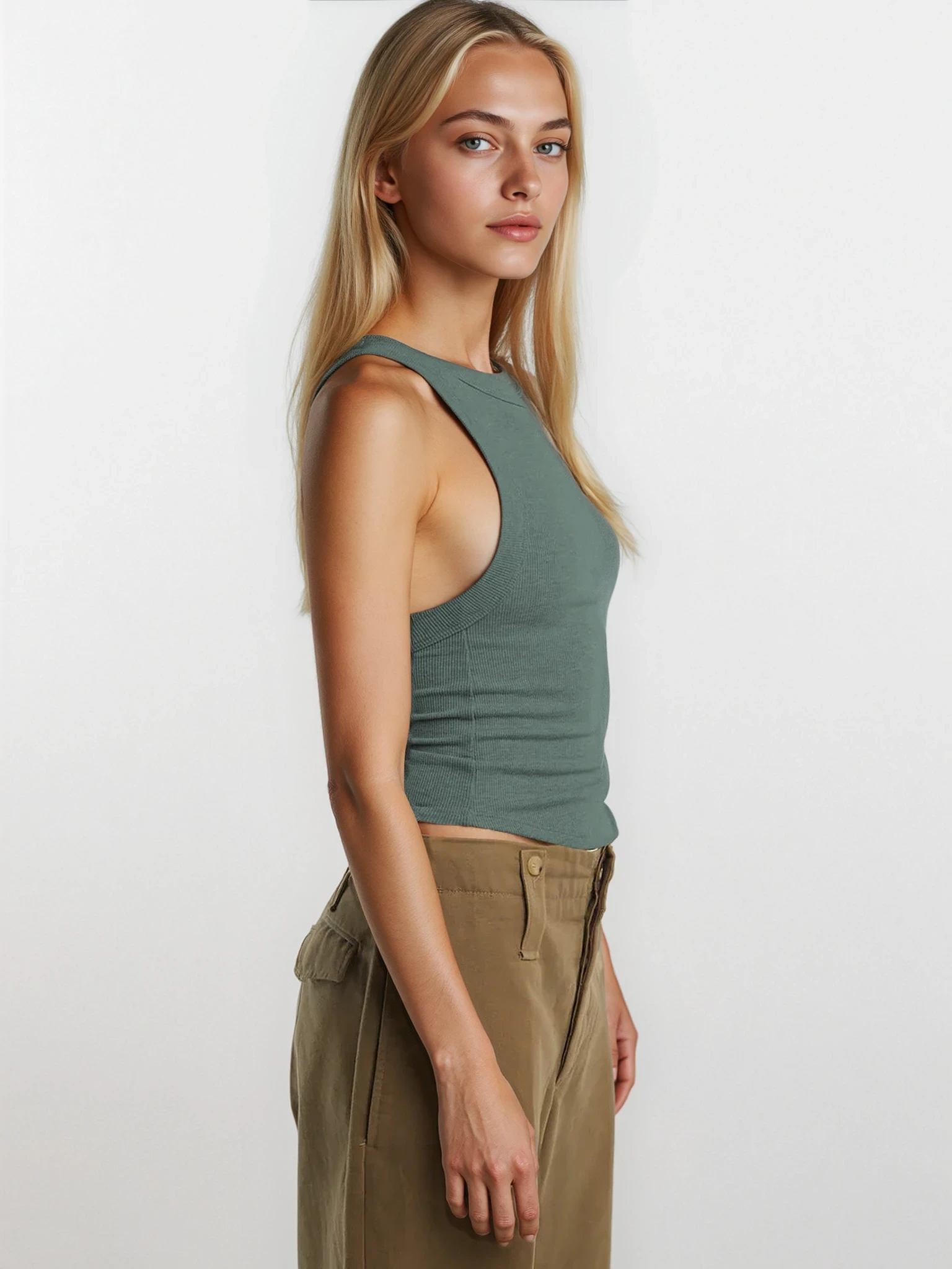 Light gray sleeveless rib-knit halter neck cropped tank top from Trendsi, featuring a fitted design and halter straps.
