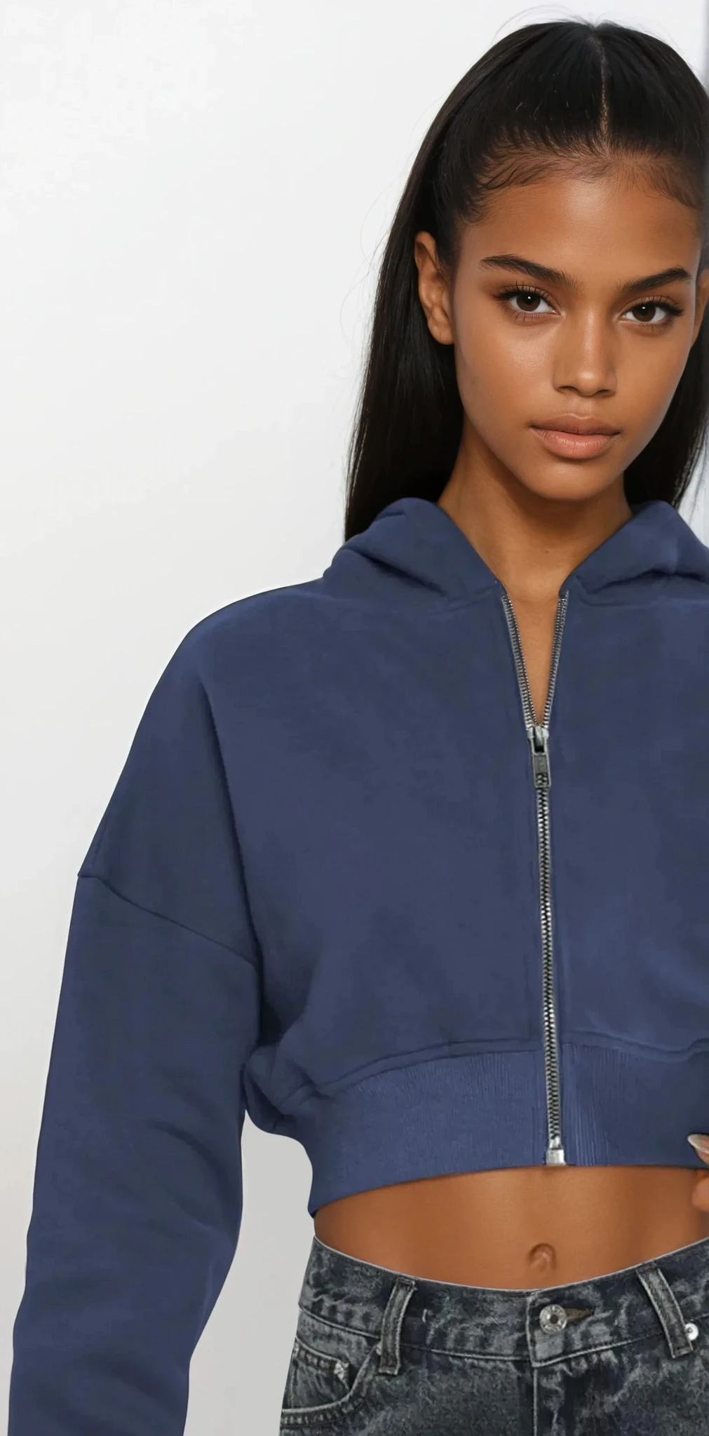 Light gray Downtown Cropped Hoodie by Trendsi, full zip front, casual cropped style, with ribbed cuffs and waistband, in a bright studio setting.
