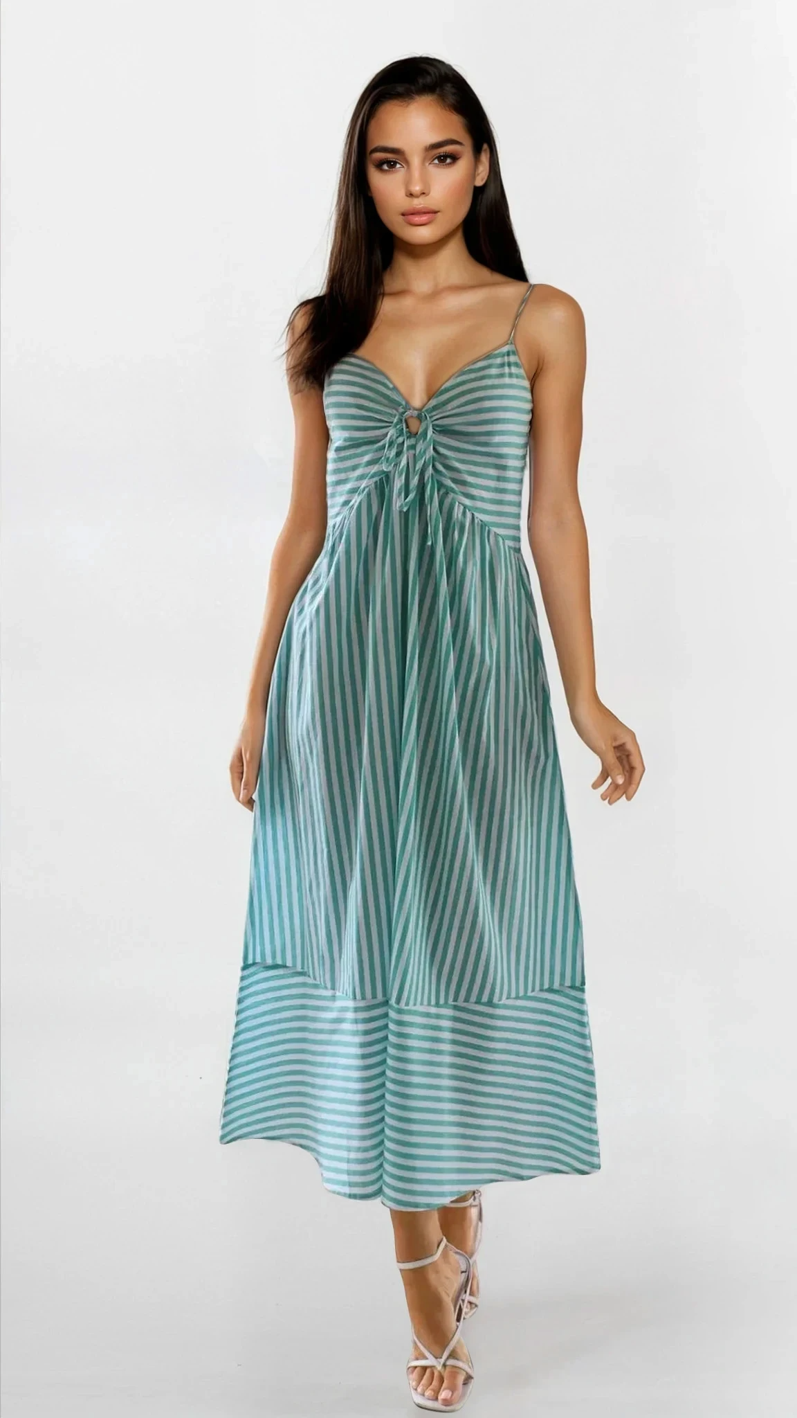 Sunset Stripe Cami Midi Dress by Trendsi featuring a lightweight fabric, adjustable straps, and a stylish midi length with vibrant sunset stripes.