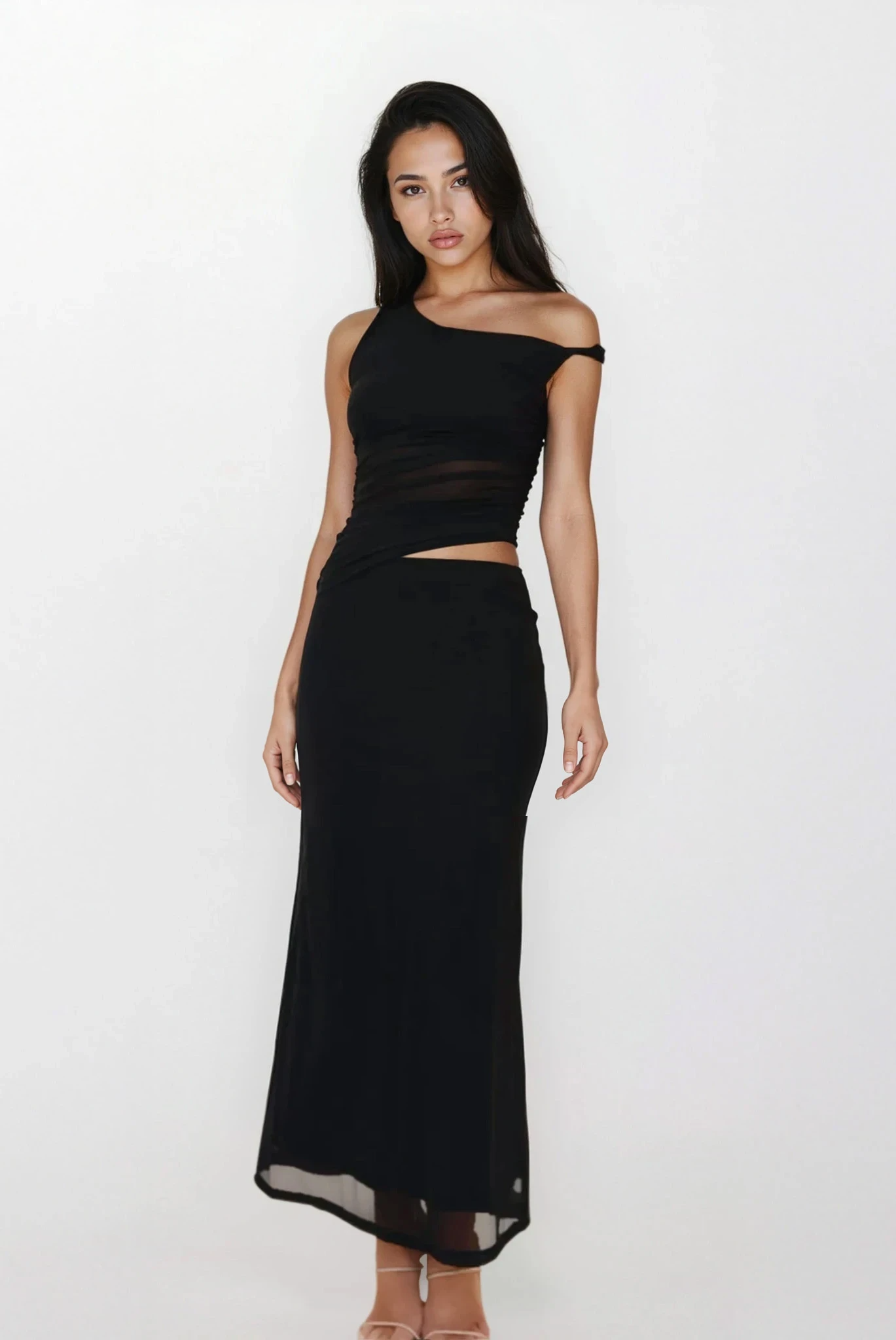 Light blue Echelon asymmetrical cutout sleeveless dress from Trendsi featuring a stylish design and modern silhouette.