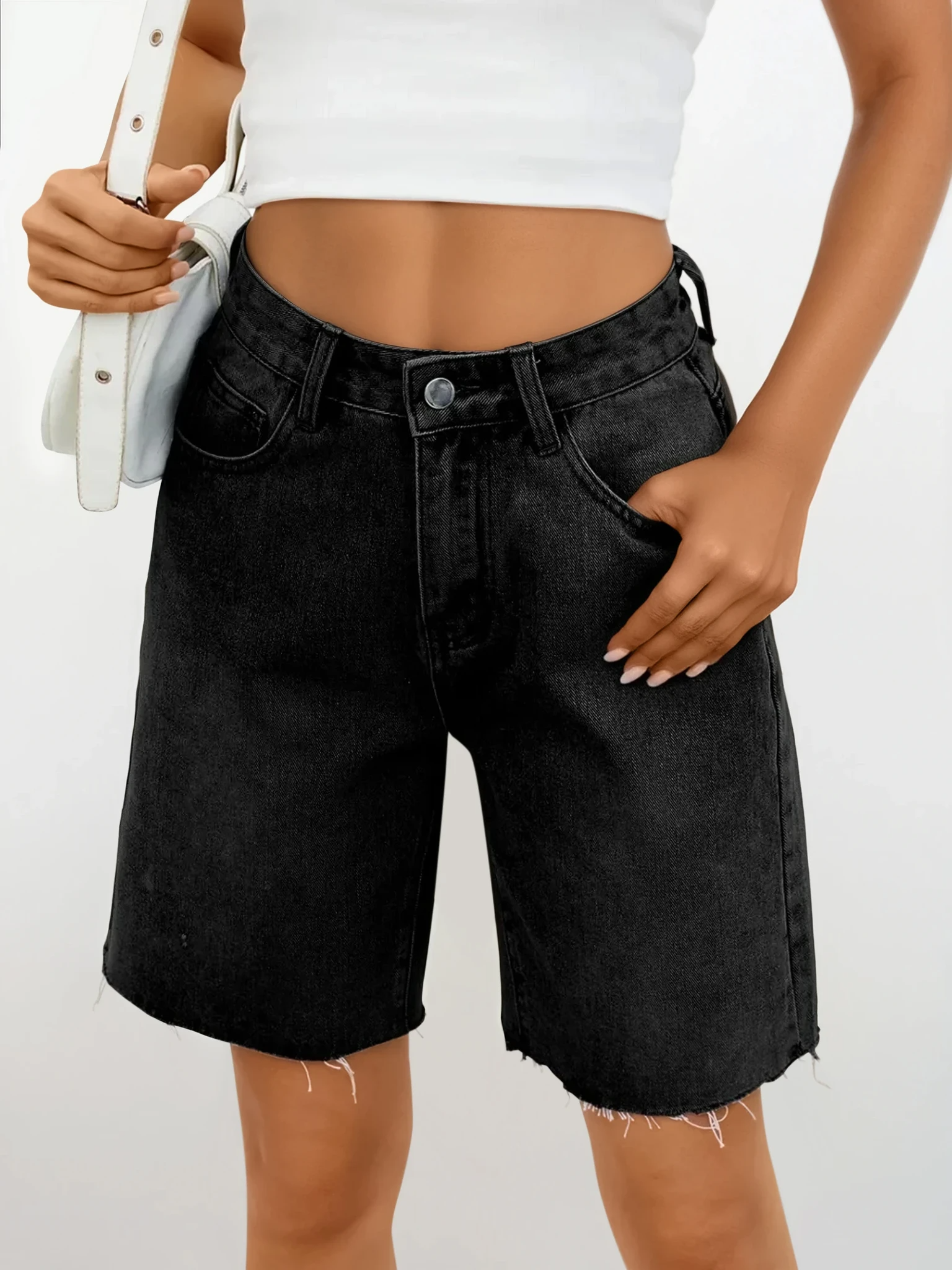 Light blue Rogue Raw Hem Denim Shorts by Trendsi, casual clothing with distressed edges and classic denim style.