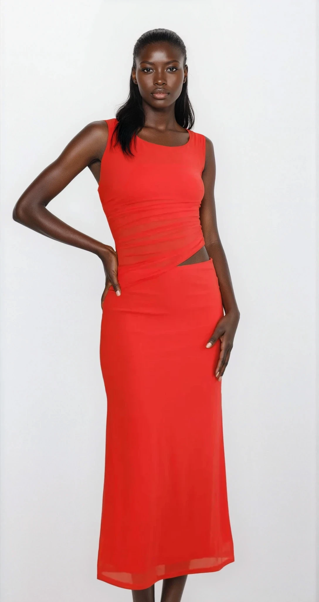 Light-colored Echelon asymmetrical sleeveless dress with cutout details, showcasing a stylish and modern clothing design.