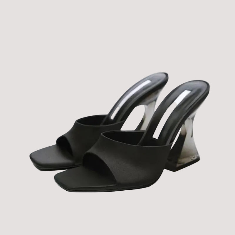 Open toe high heel sandals from Trendsi featuring sleek design and stylish straps, perfect for elegant summer occasions.