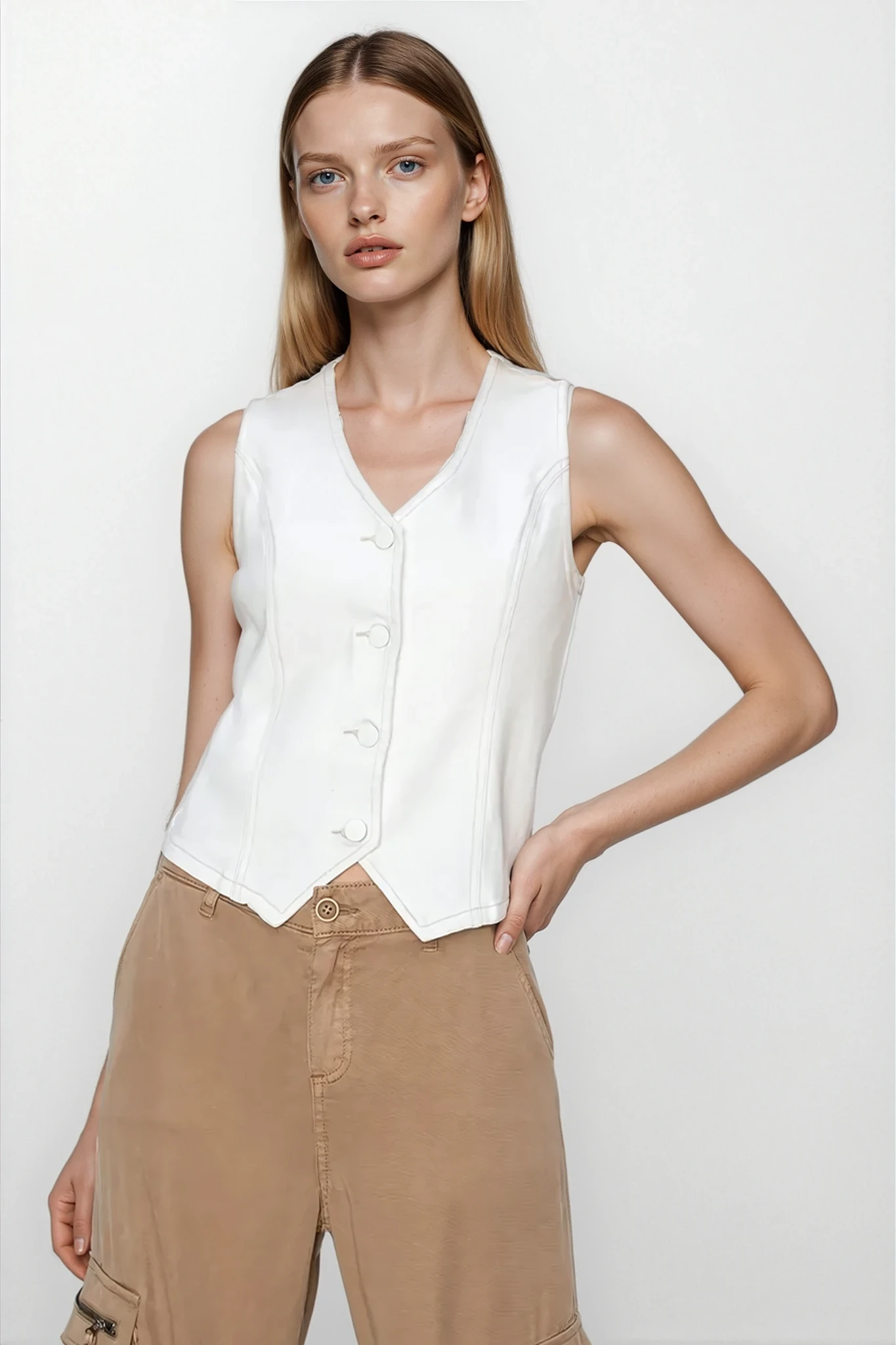 Light blue Marlo V‑Neck Cropped Vest by Trendsi, close-up of fitted sleeveless top with V-neck and cropped length.