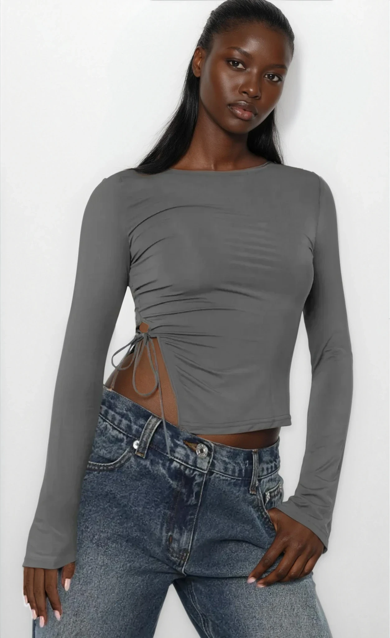 Light beige tied slit round neck long sleeve top from Trendsi, featuring a relaxed fit and stylish design.