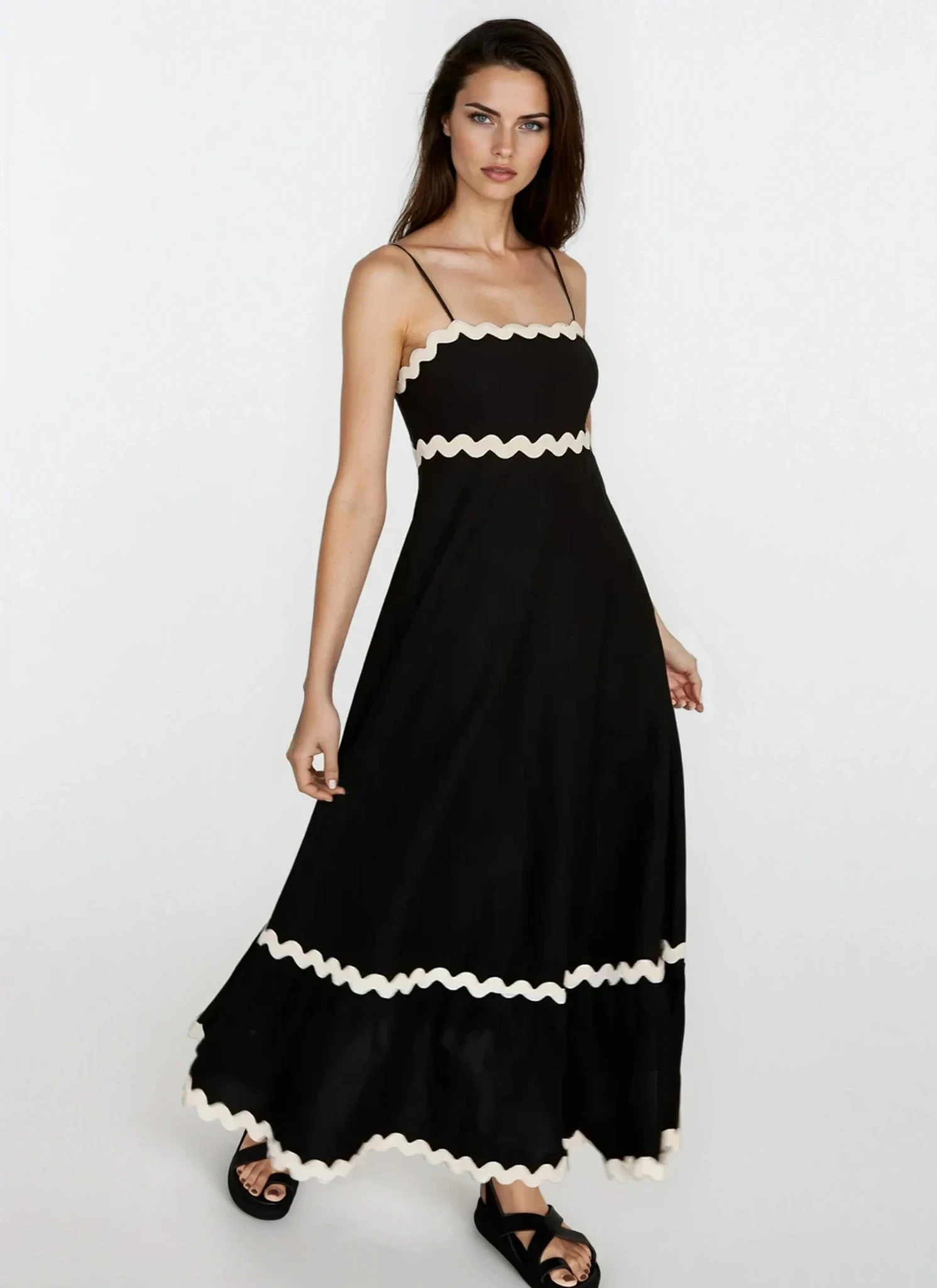 Light blue Tidal spaghetti strap maxi dress from Trendsi, flowing fabric with thin straps and a relaxed fit.