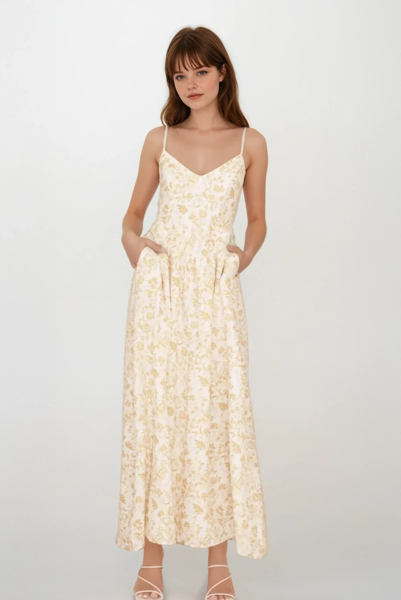 Light pink Fleuron bow back V-neck cami dress with floral details, featuring a fitted silhouette and delicate straps.