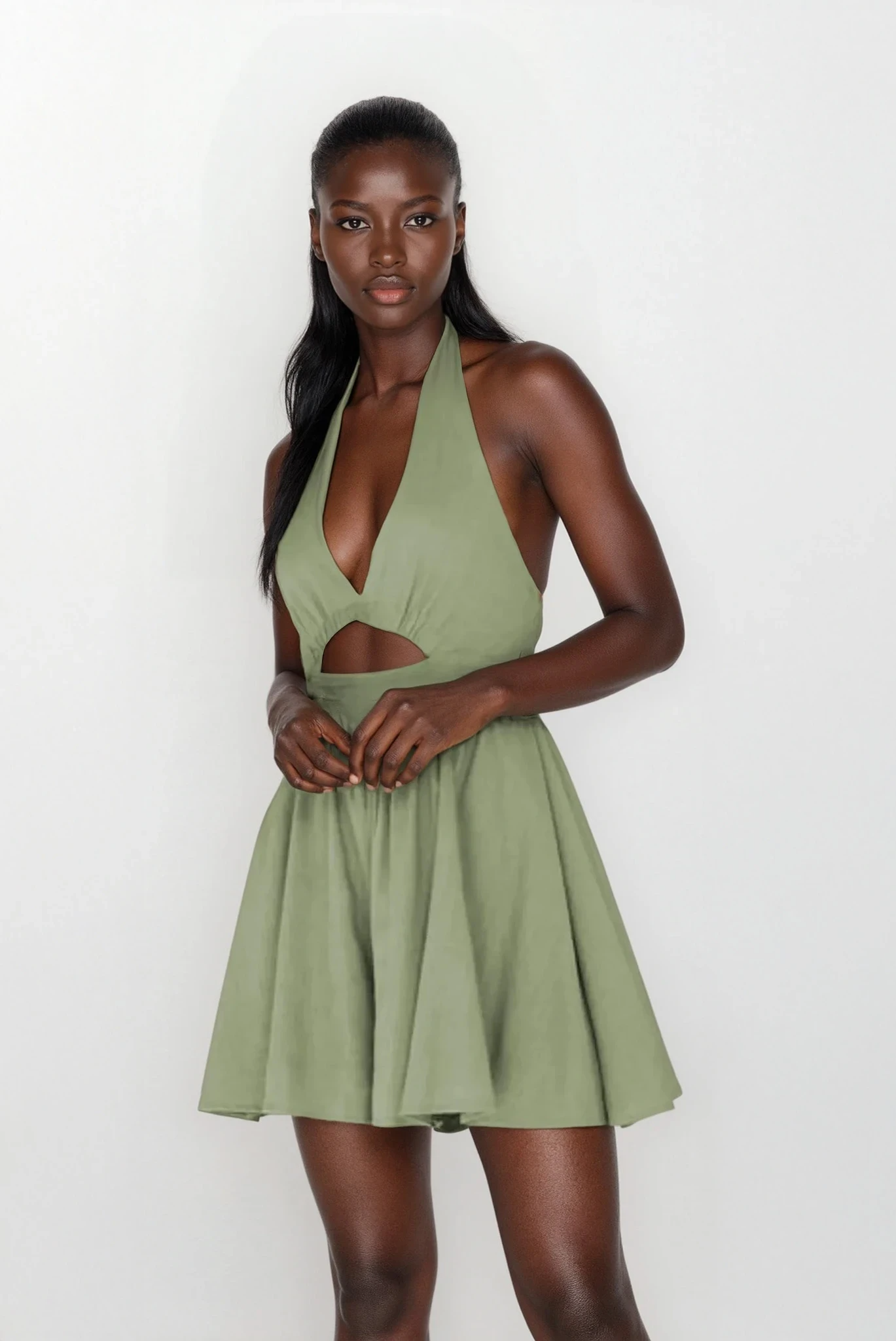 Light blue Lumina Cutout Halter Neck Mini Dress by Trendsi featuring a stylish halter neckline and cutout details.