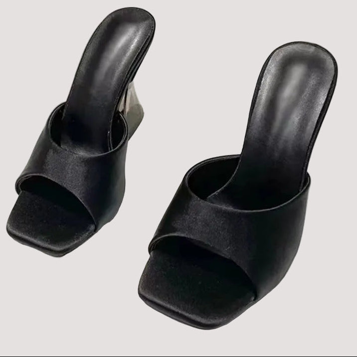 Open toe high heel sandals by Trendsi featuring sleek design and stylish straps, perfect for dressy occasions.