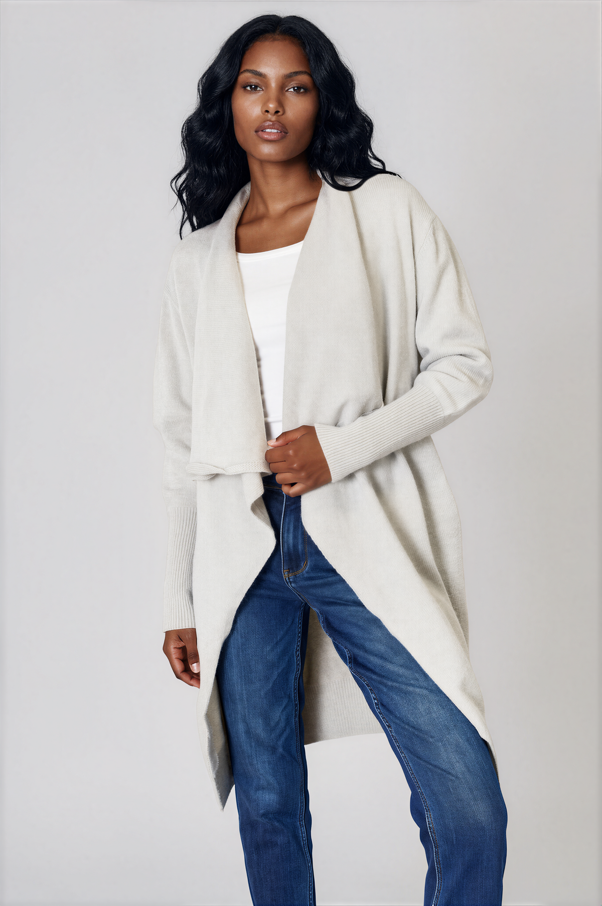 Angelic Open Front Duster Cardigan in ivory knit with long sleeves, an open front, ribbed cuffs, and a longline hem