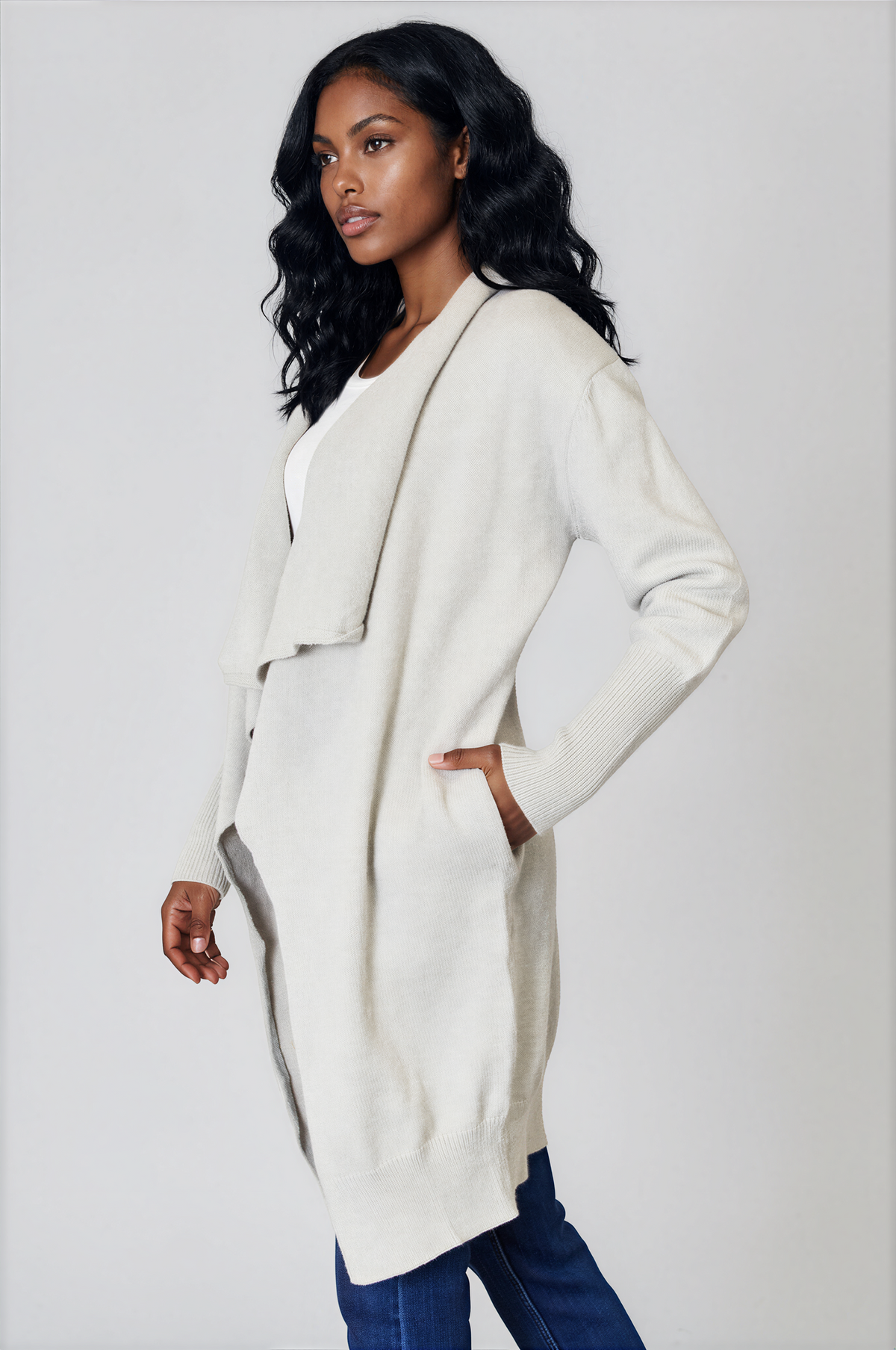 Angelic Open Front Duster Cardigan in ivory knit with long sleeves, ribbed cuffs and hem, and front pockets
