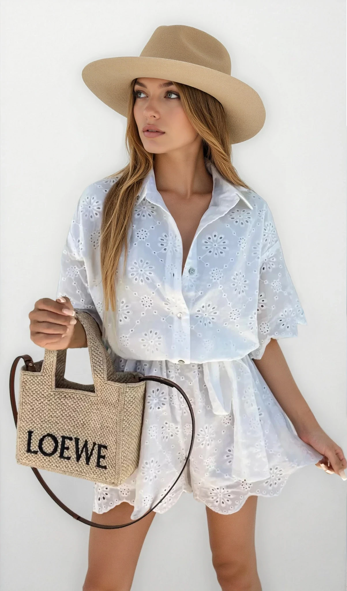 Light blue Elysia eyelet lace button-up romper by Trendsi, featuring short sleeves and a relaxed fit, displayed on a hanger.