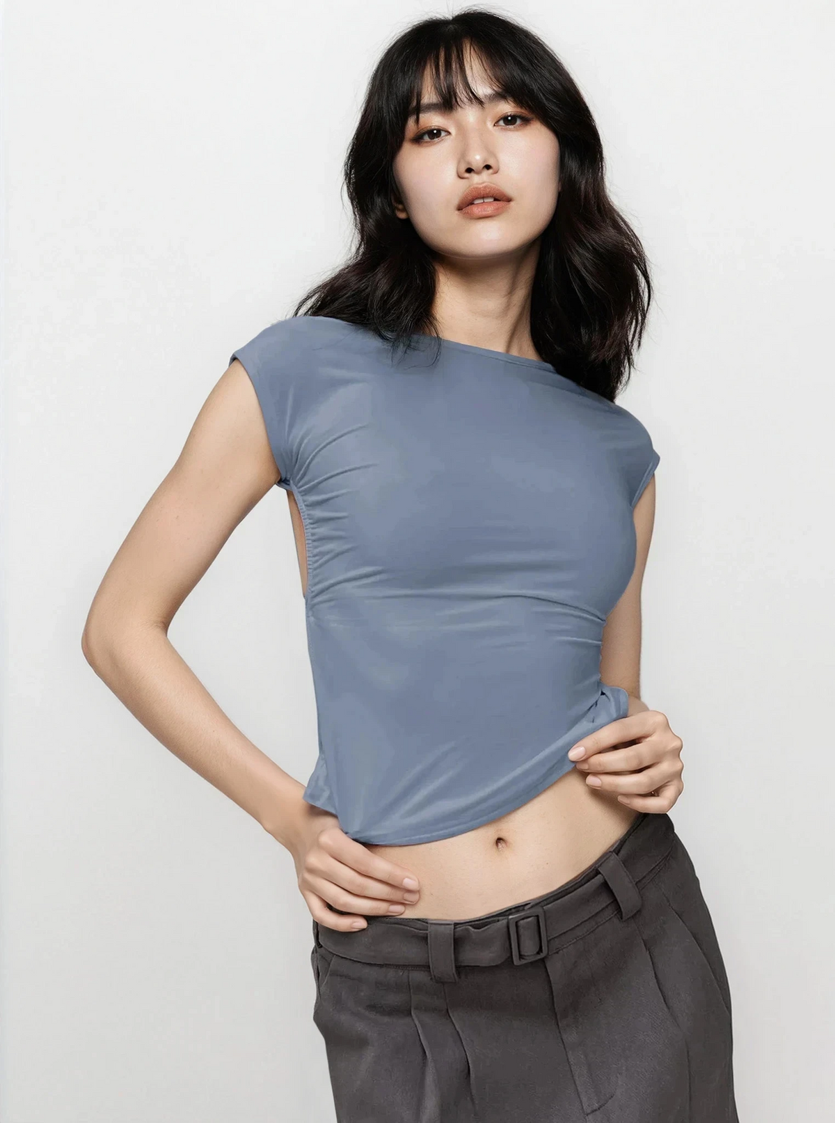 Backless short sleeve cropped blouse on mannequin