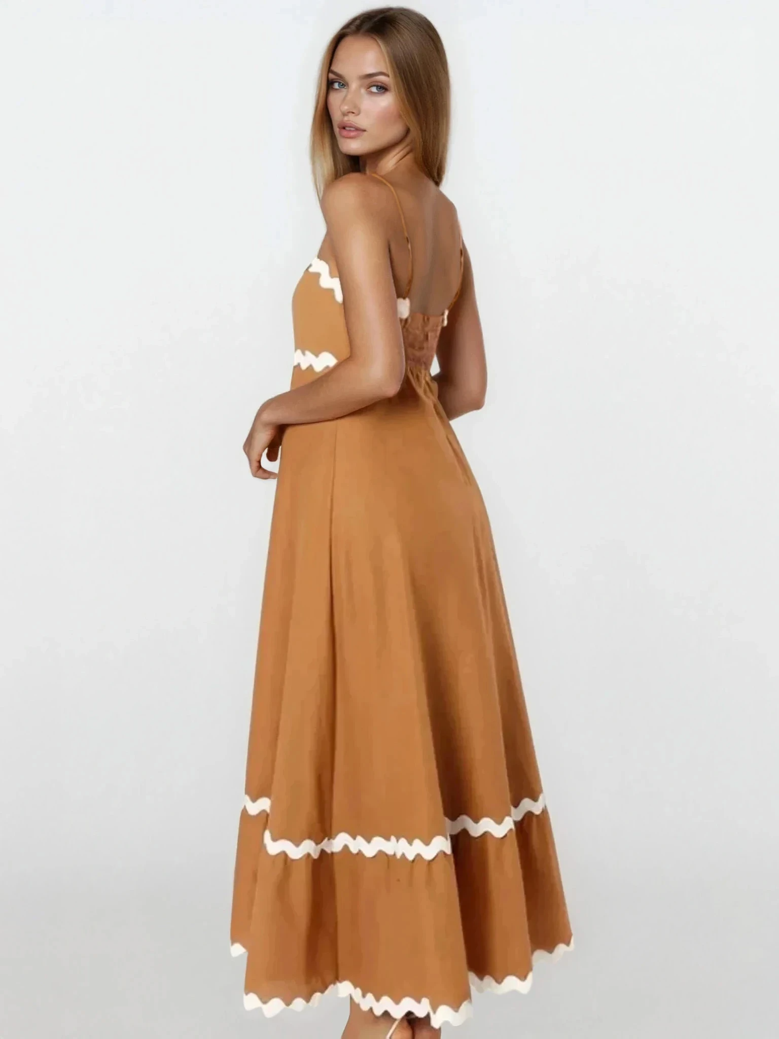 Light blue Tidal spaghetti strap maxi dress by Trendsi featuring a flowy silhouette and adjustable straps.