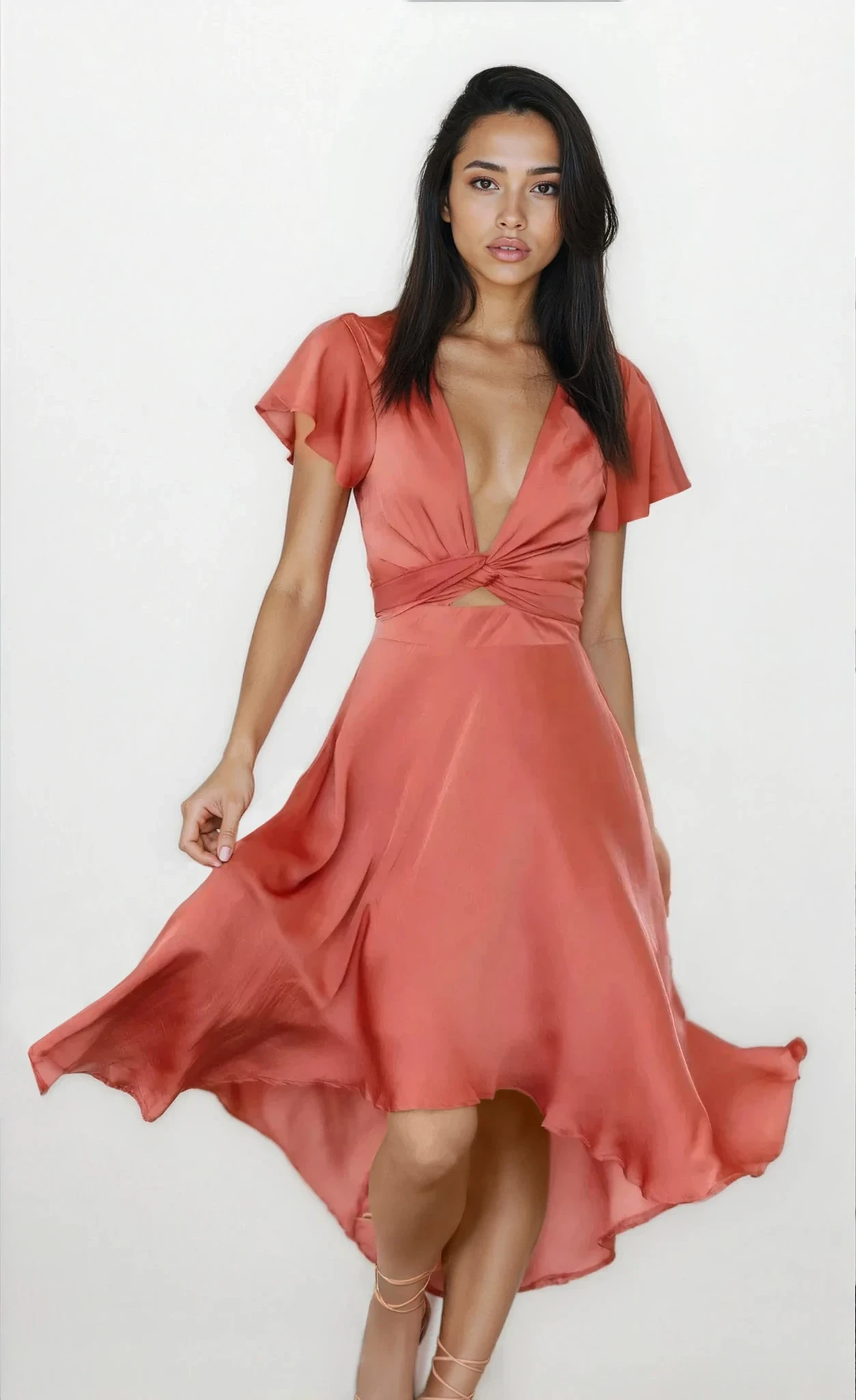 Light blue Evolve V-Neck High-Low Flutter Sleeve Dress by Trendsi, featuring a flowing high-low hem and flutter sleeves.