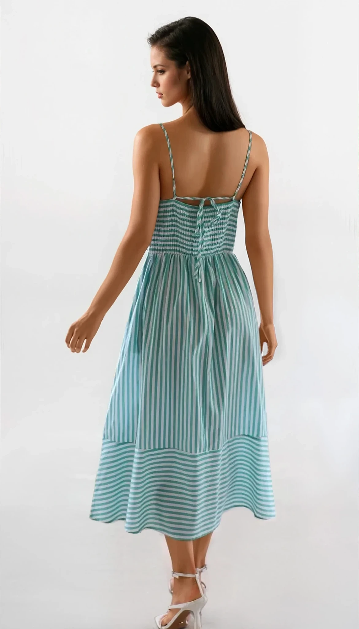 Sunset Stripe Cami Midi Dress by Trendsi featuring a flowing silhouette, vibrant sunset stripe pattern, and lightweight fabric.
