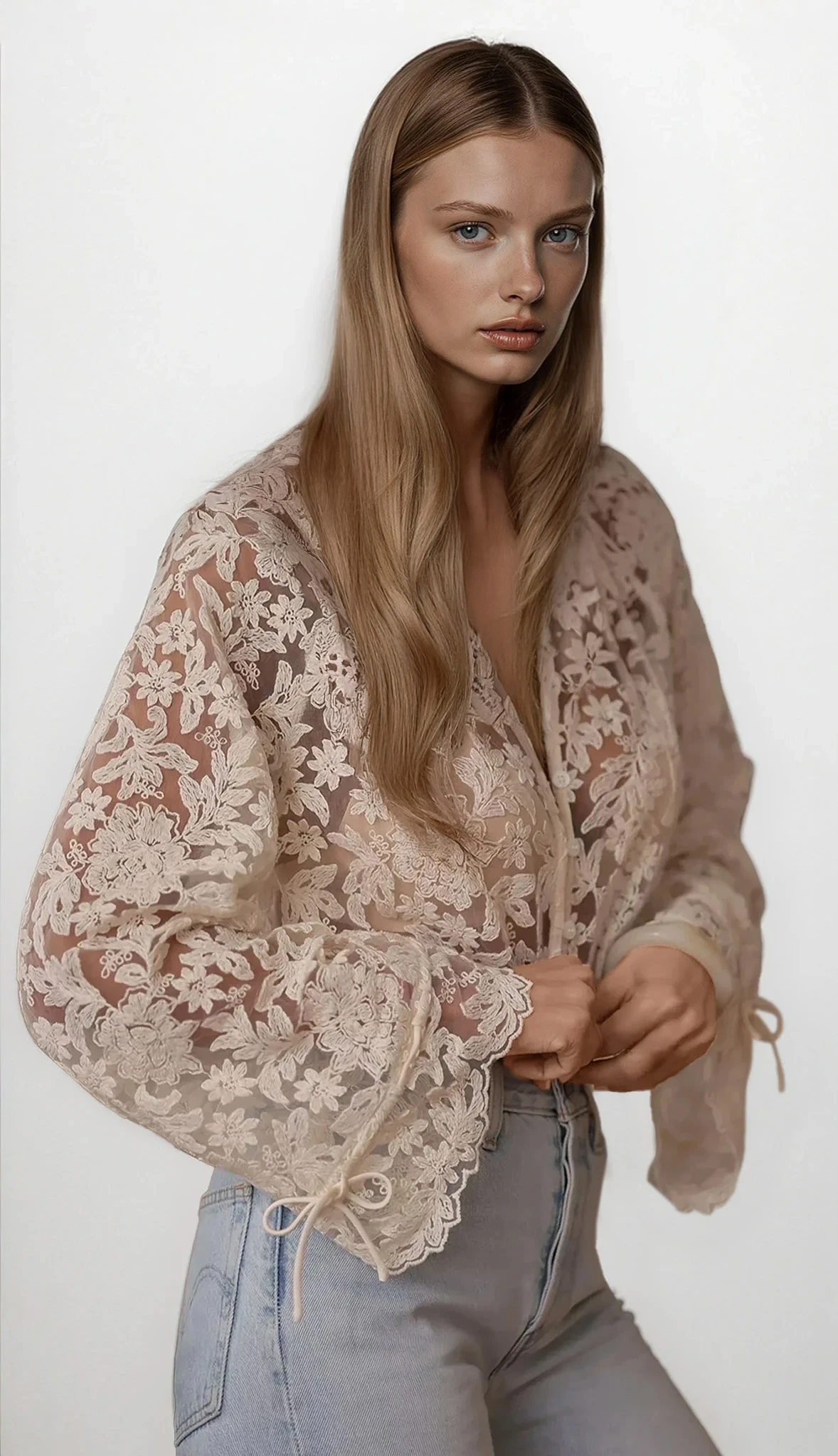 Light-colored vintage lace button-up long sleeve shirt by Trendsi, featuring delicate lace details and classic collar.