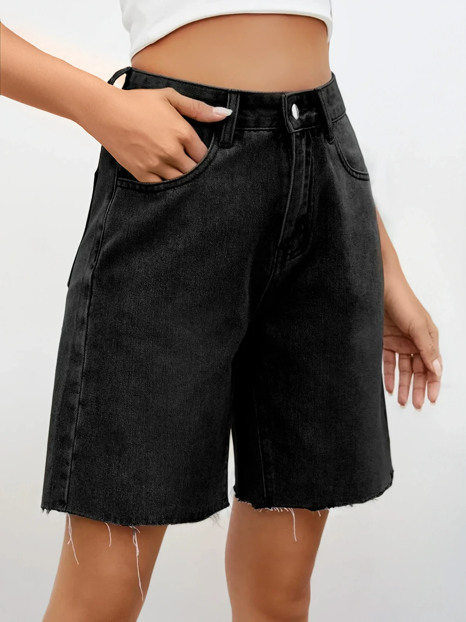 Light denim Rogue Raw Hem Denim Shorts by Trendsi featuring distressed edges and casual fit, perfect for summer wear.