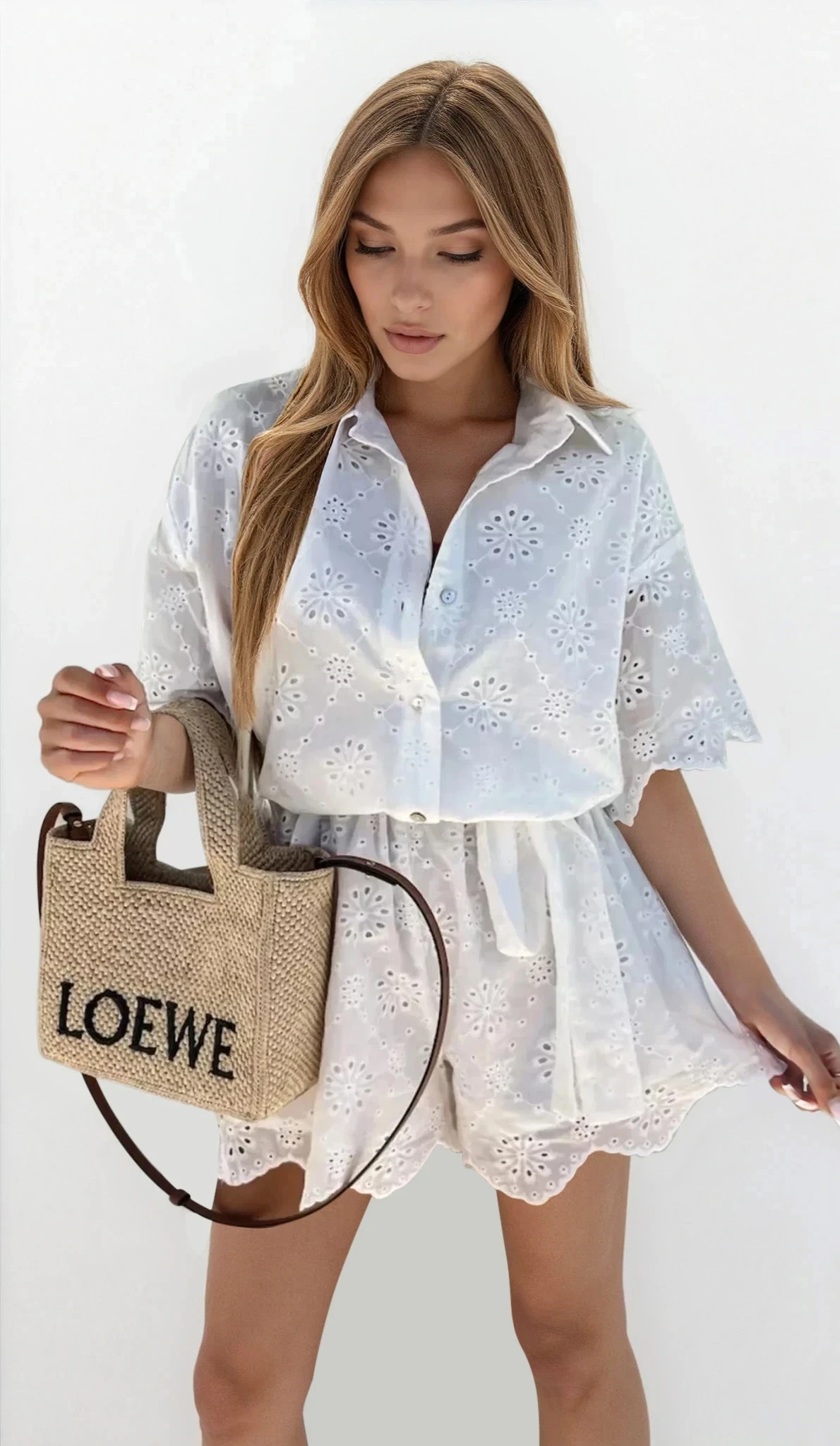 Elysia eyelet lace button-up romper with tied waist and half sleeves