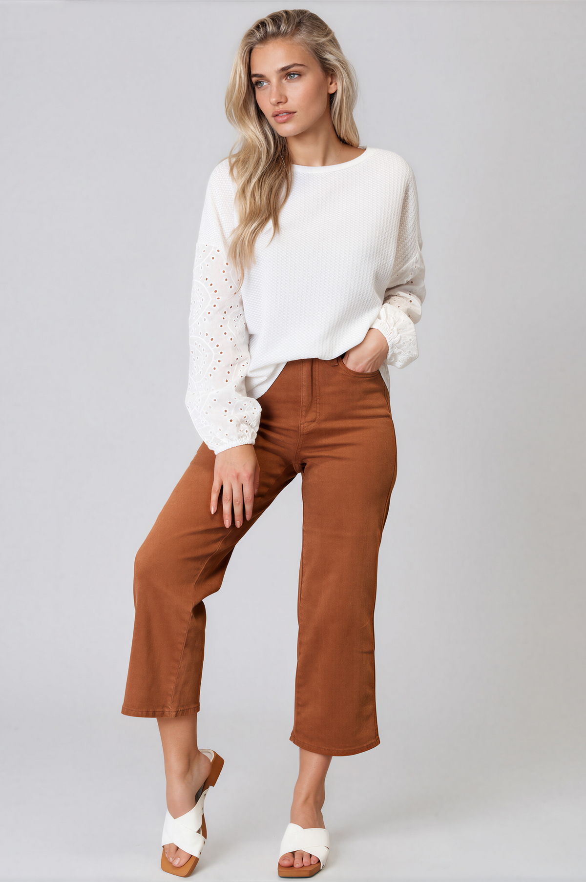 Ethereal Round Neck Eyelet Dropped Shoulder Blouse in white with long sleeves, eyelet lace panels, and a relaxed fit