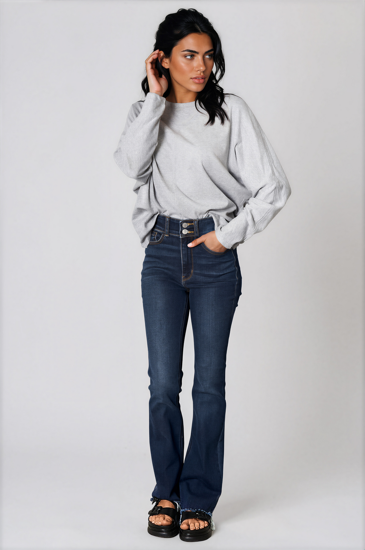 Everyday Round Neck Long Sleeve Top in light gray, with a solid knit finish, relaxed fit, and gathered cuffs