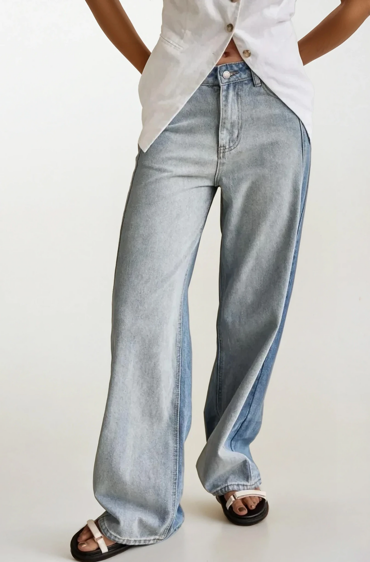 Light blue contrast straight leg jeans from Trendsi showcasing a classic fit and stylish design on a white background.