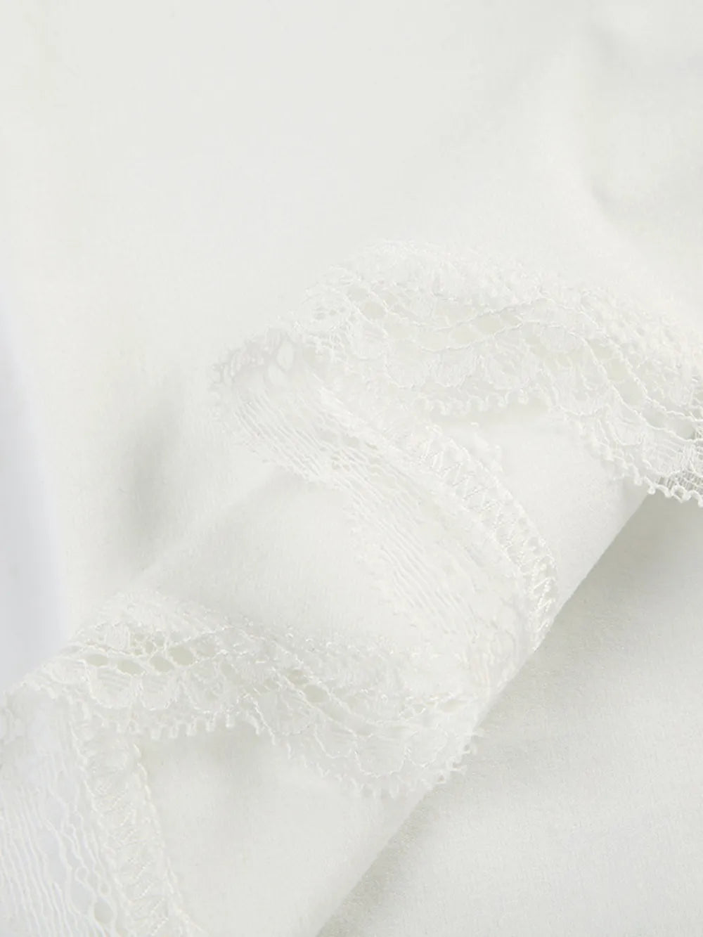 Lace sweetheart neckline short sleeve blouse from Trendsi featuring delicate lace fabric and a feminine fit.