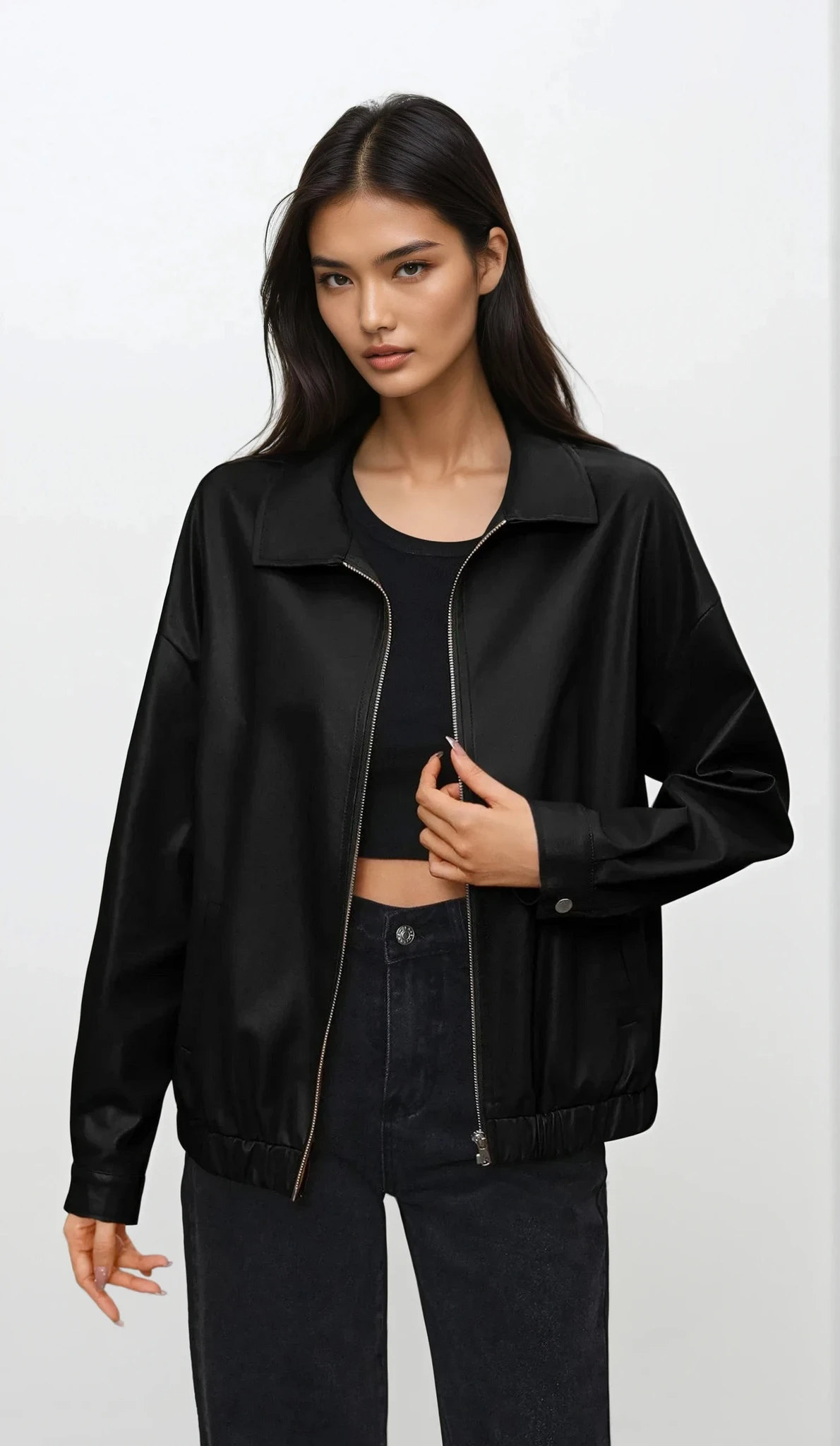 Faux leather full zip jacket with collared neck and long sleeves
