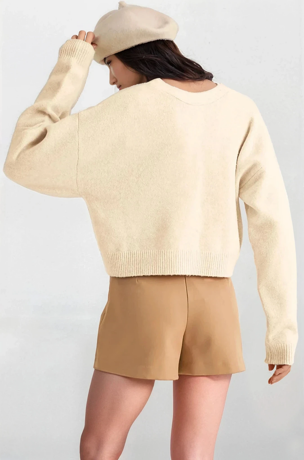 Gifted V-neck cardigan with bows in lightweight solid fabric