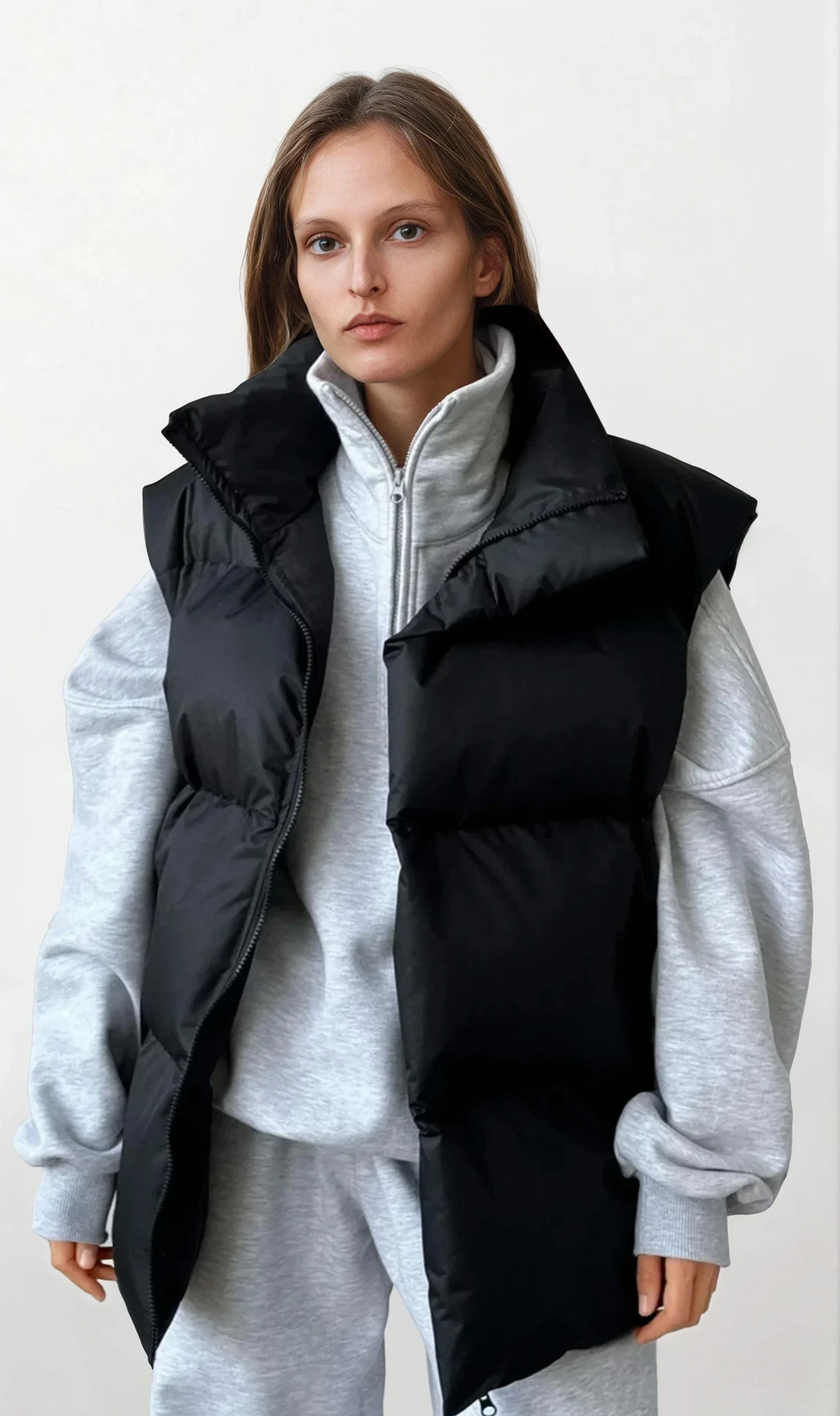 Icy turtleneck puffer vest coat with full zip and solid pattern
