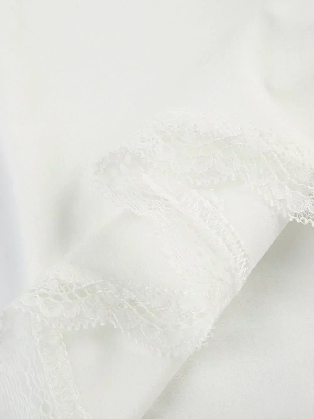 Lace sweetheart neckline short sleeve blouse from Trendsi featuring delicate lace fabric and a feminine fit.