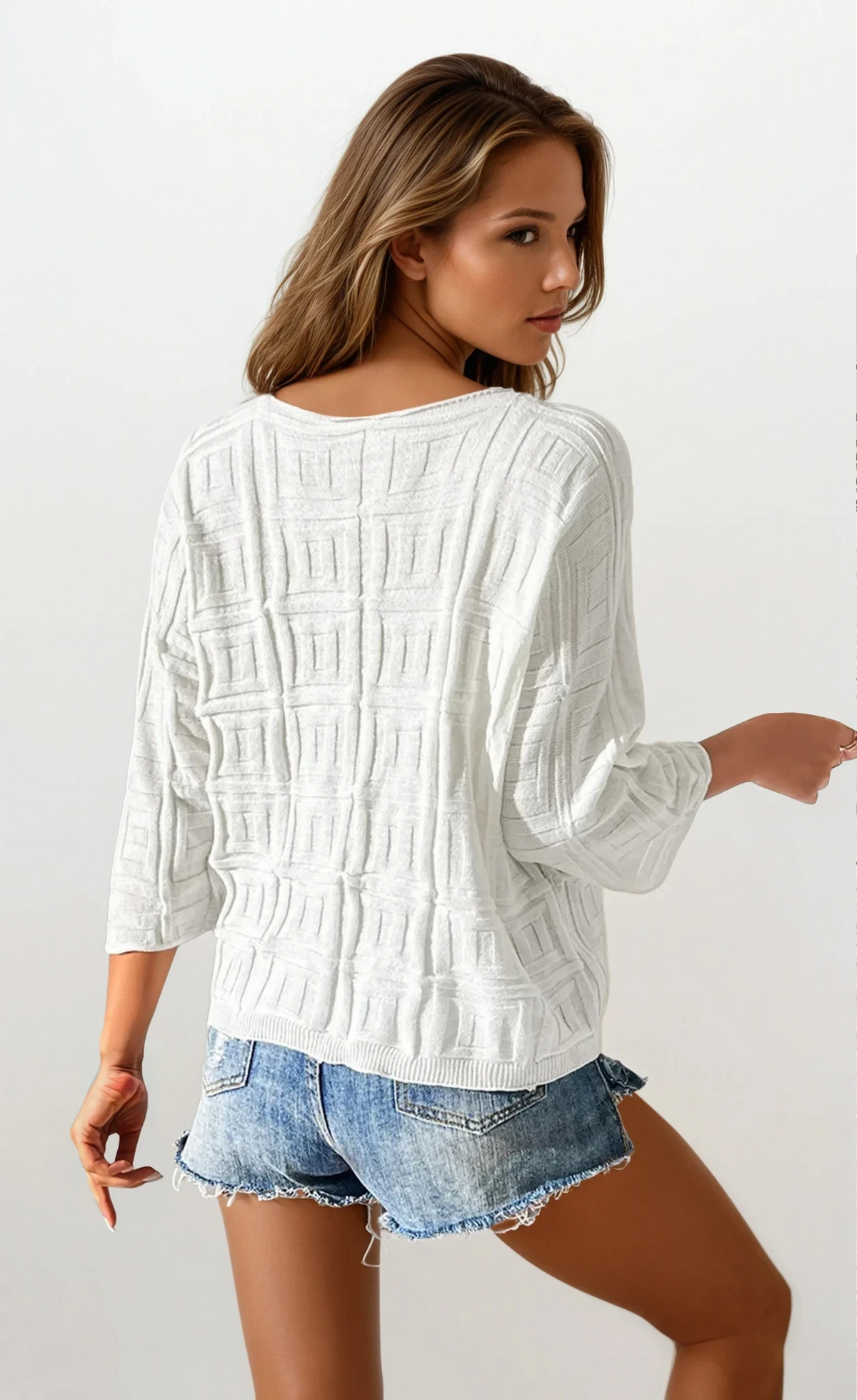 Maze V-neck three-quarter sleeve knit top with abstract pattern