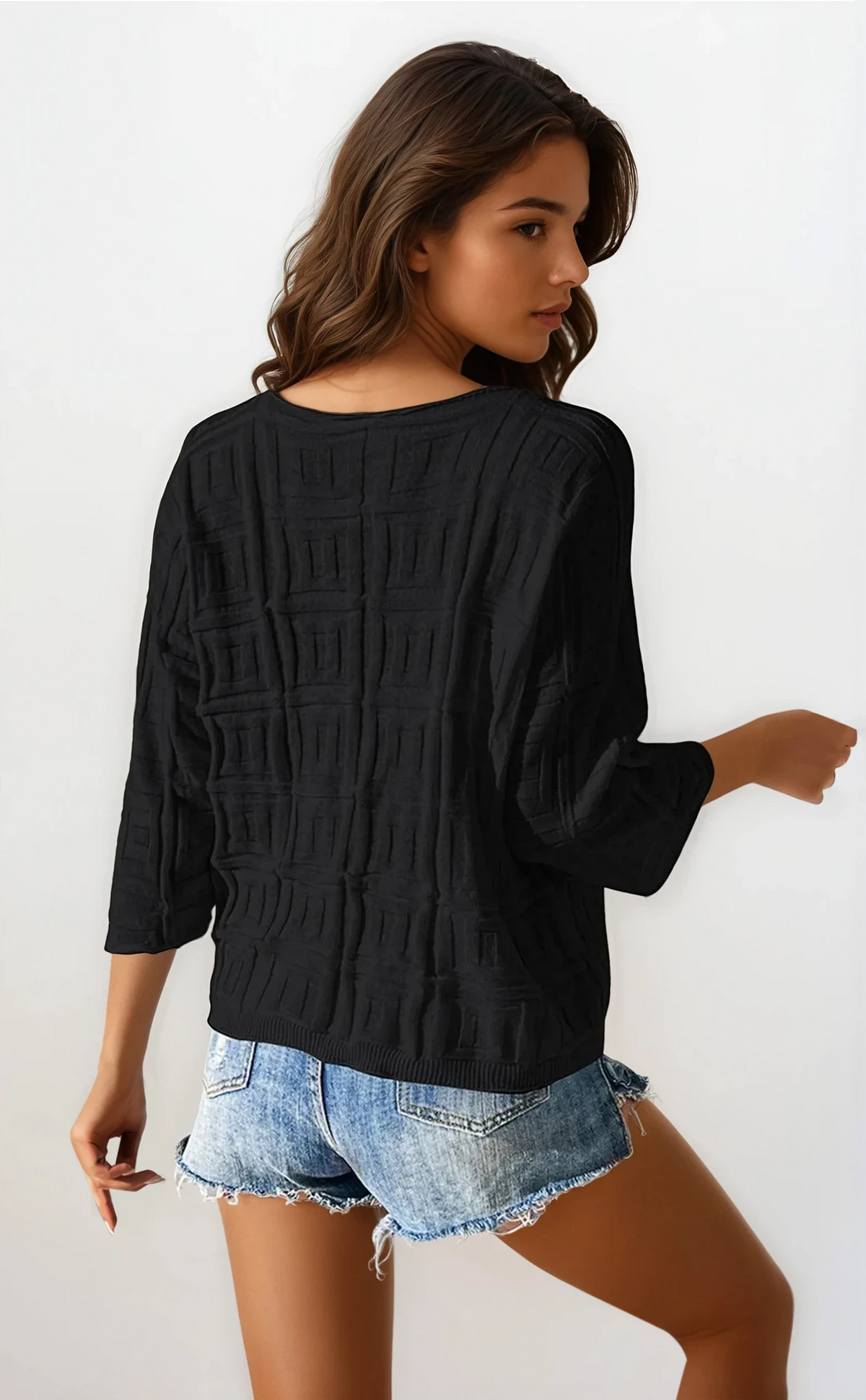 Maze V-neck three-quarter sleeve knit top with abstract pattern