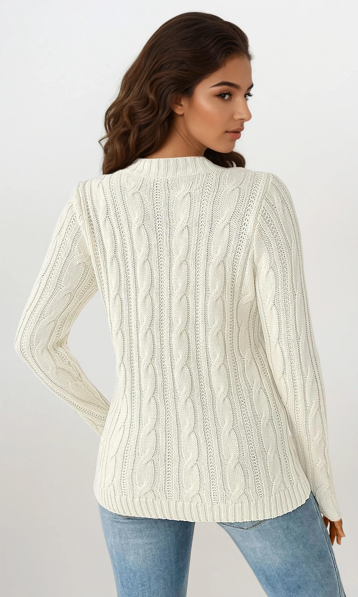 Modern boutique women's cable-knit crew neck sweater in solid pattern