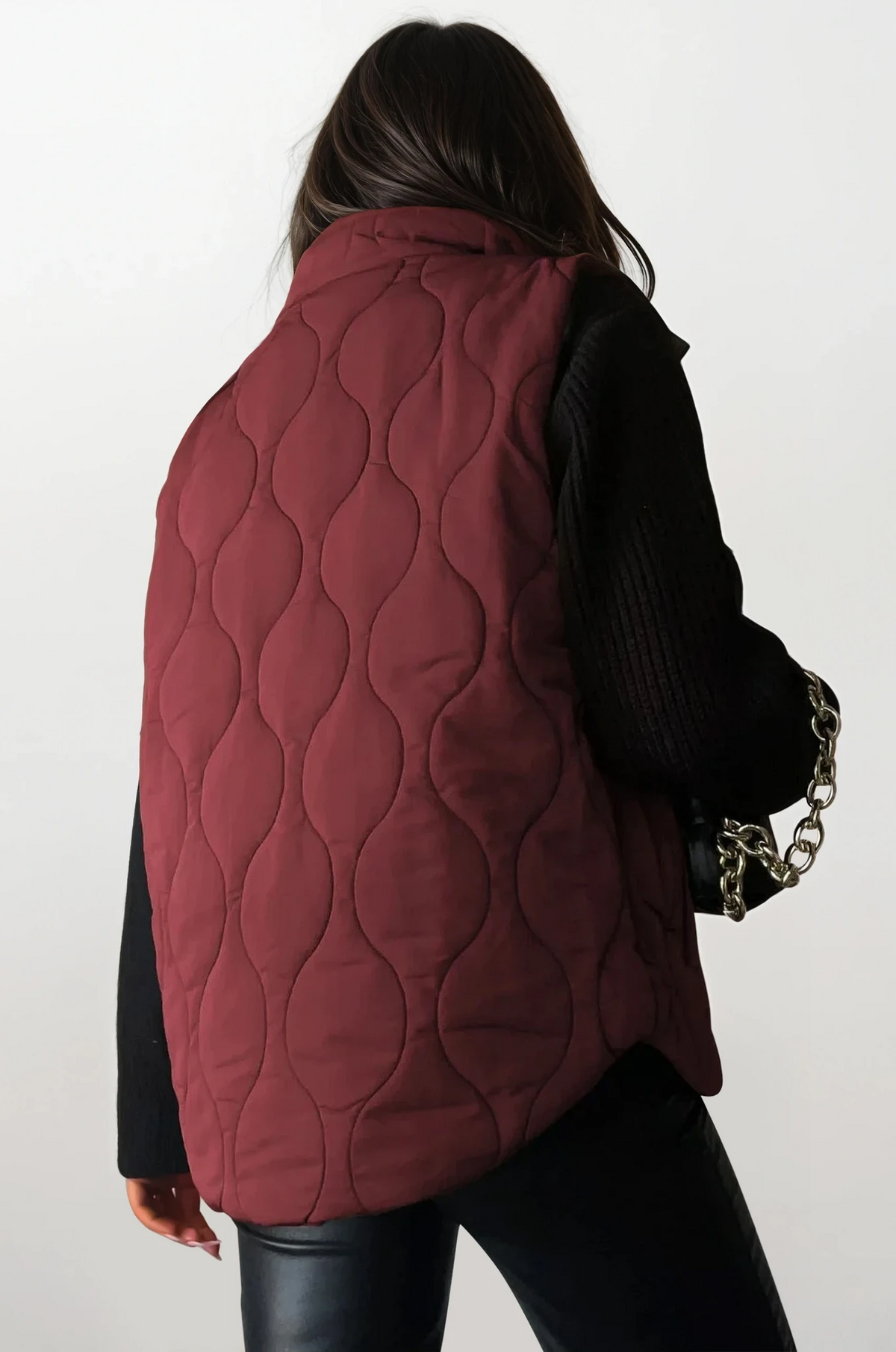 quilted collared neck vest with sleeveless design and pockets