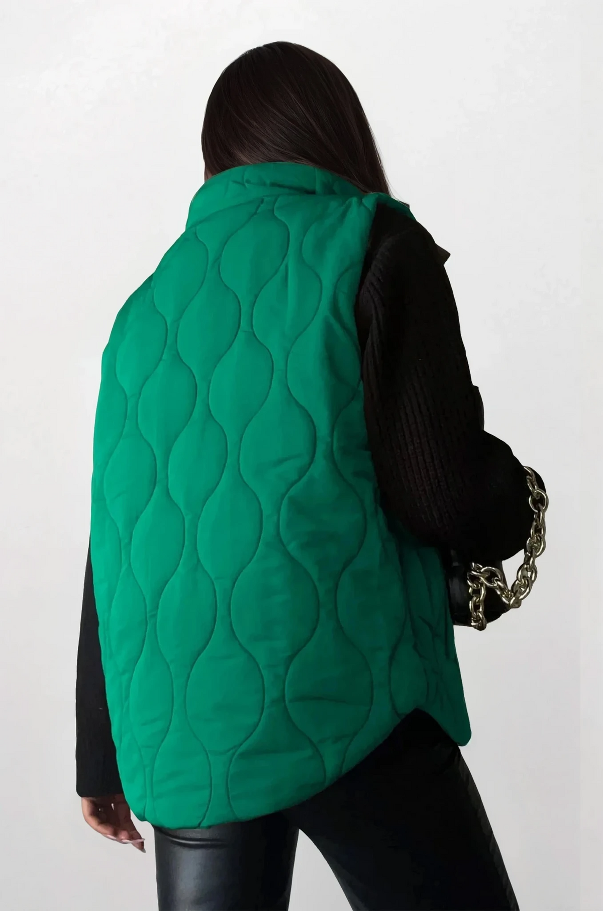 Quilted collared neck vest with pockets in solid pattern