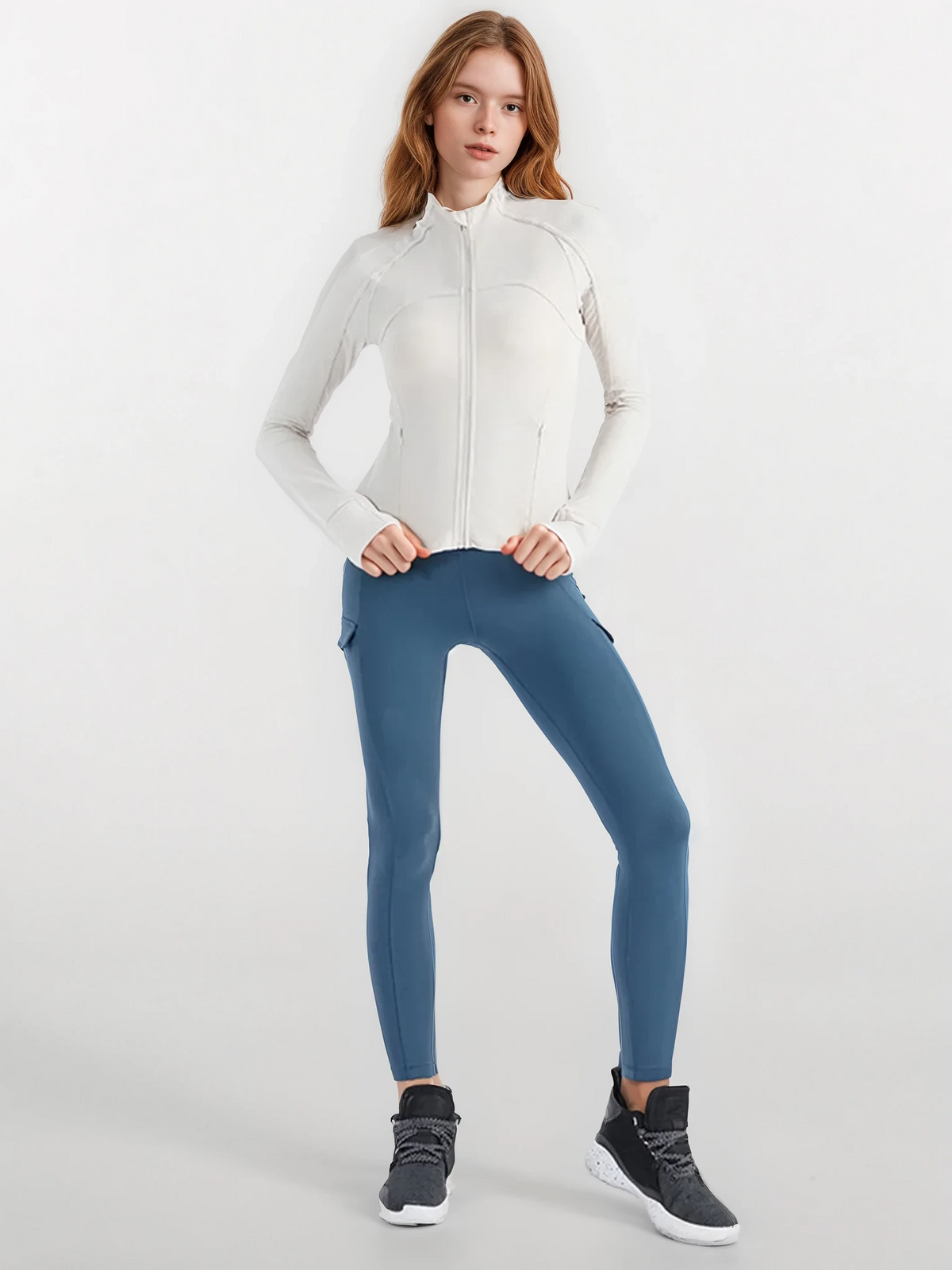Recharge full zip long sleeve jacket with stretchy fabric and thumb holes