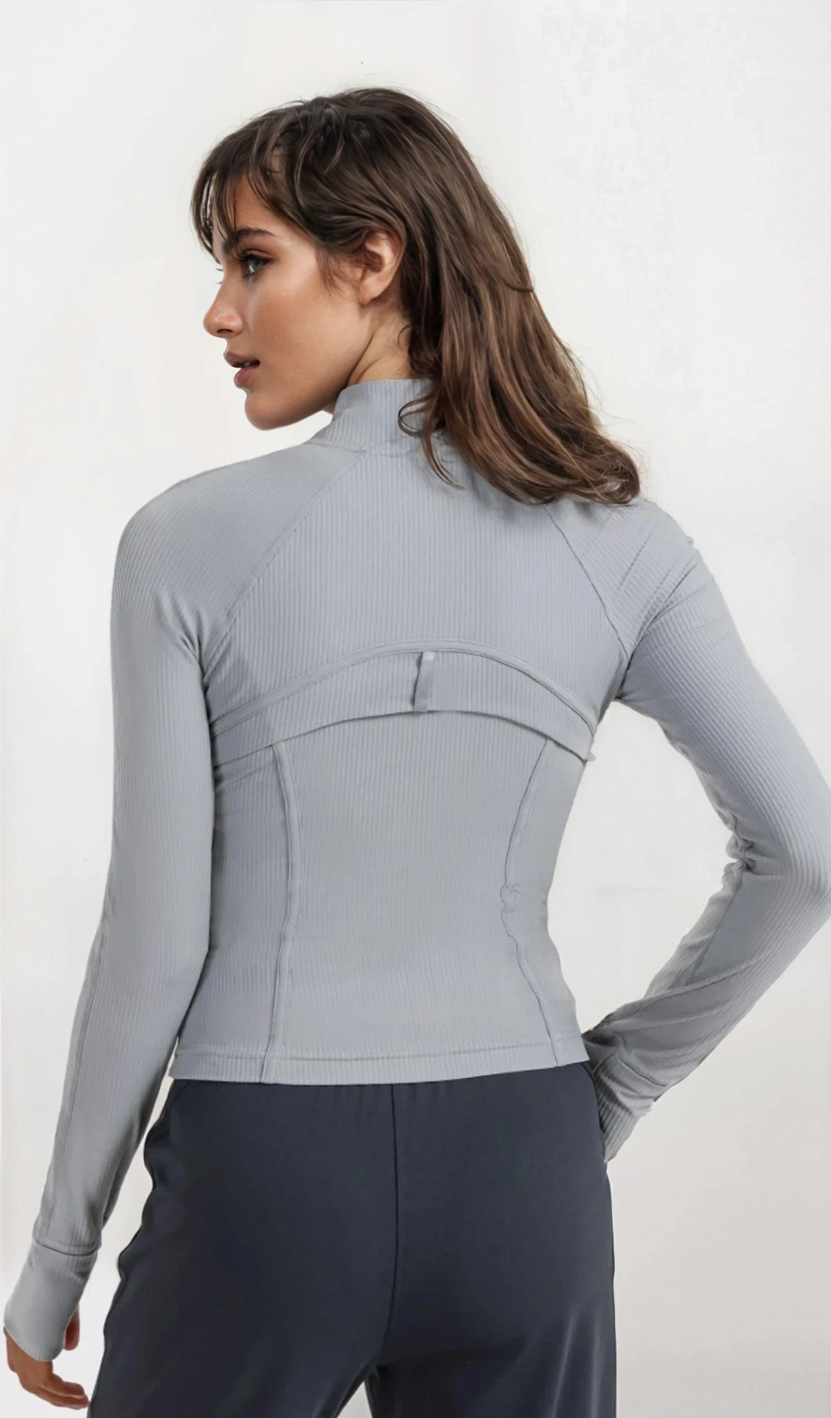 Recharge full zip long sleeve jacket with stretchy material and thumb holes