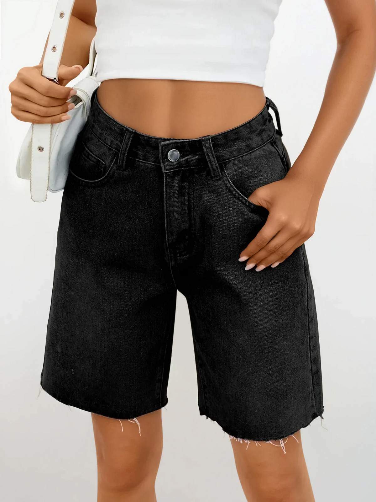 Rogue raw hem denim shorts with lightweight breathable fabric and button closure
