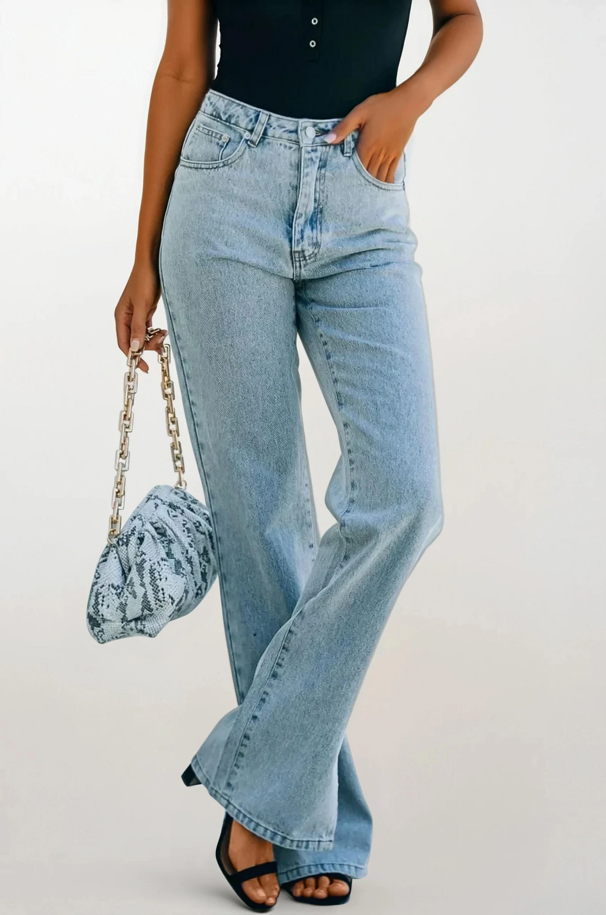 Side slit bootcut jeans with button closure and pockets