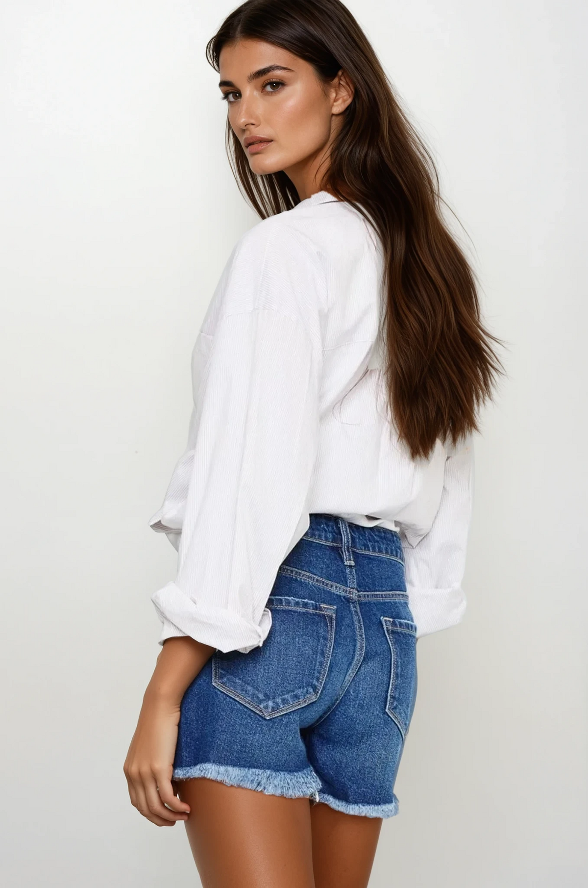 Signature high-waist frayed hem distressed denim shorts with button closure