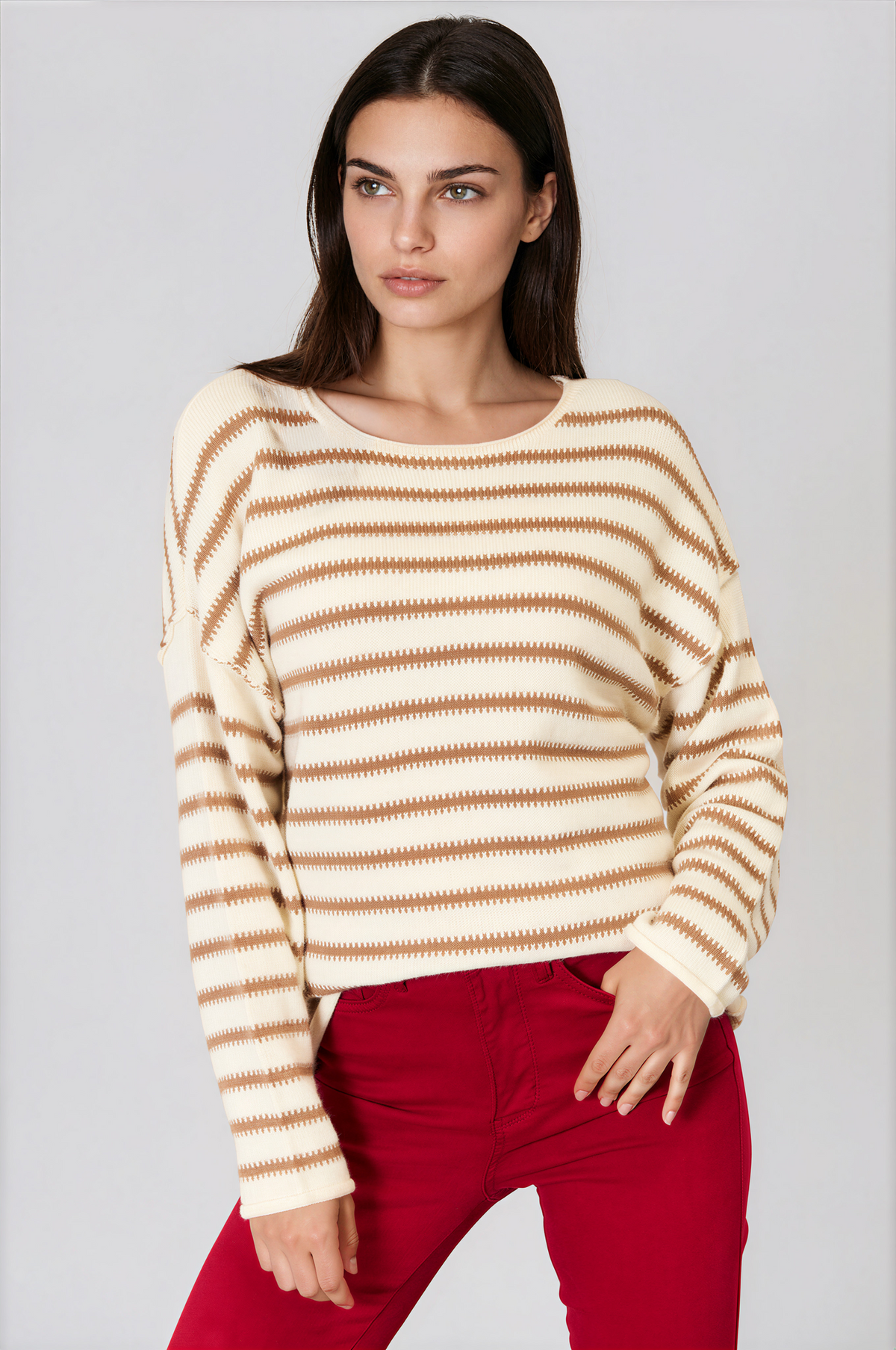 Striped Boat Neck Long Sleeve Sweater in cream with tan horizontal stripes, a wide neckline, and exposed seam details