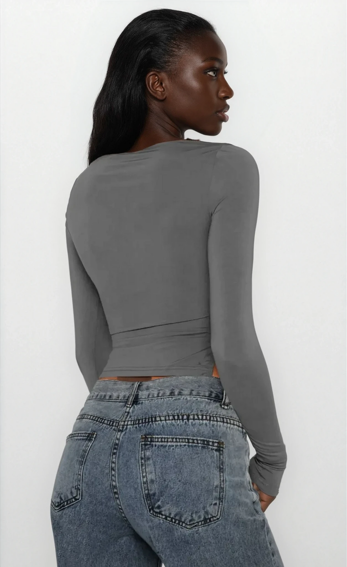 tied slit round neck long sleeve top with side slit and delicate tie detail